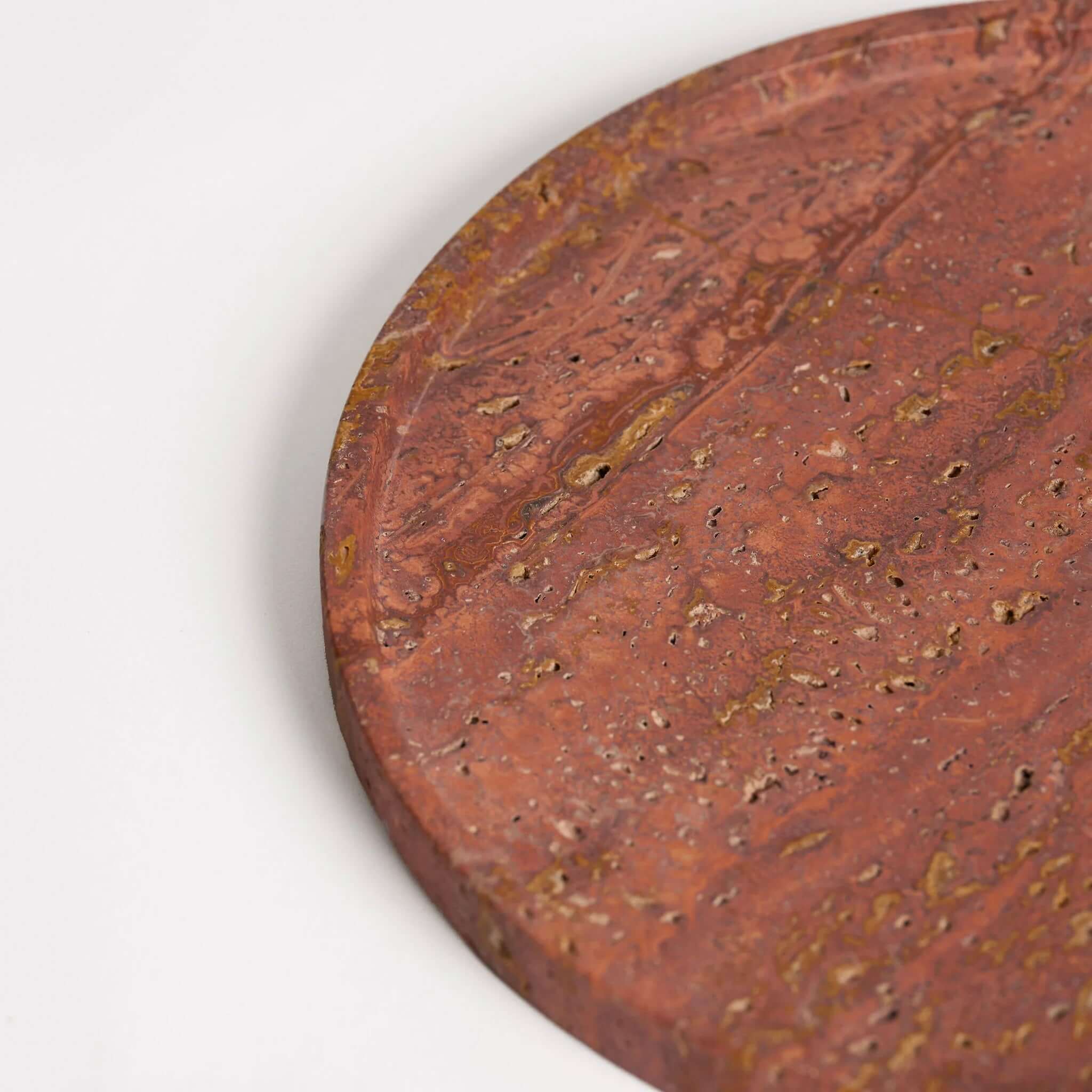 Moon Round Travertine Tray - Burnt Travertine showcasing its unique texture and warm colors.