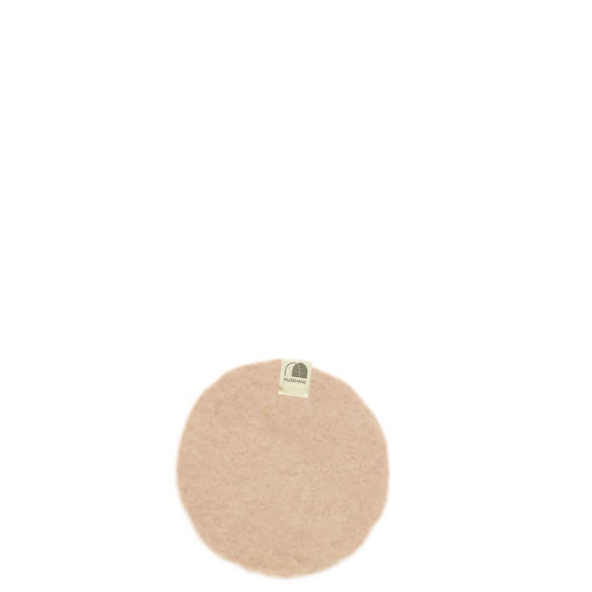 Muskhane Felt Plain Round Coaster - Nude on a white background, a handmade felt coaster in a soft nude color.