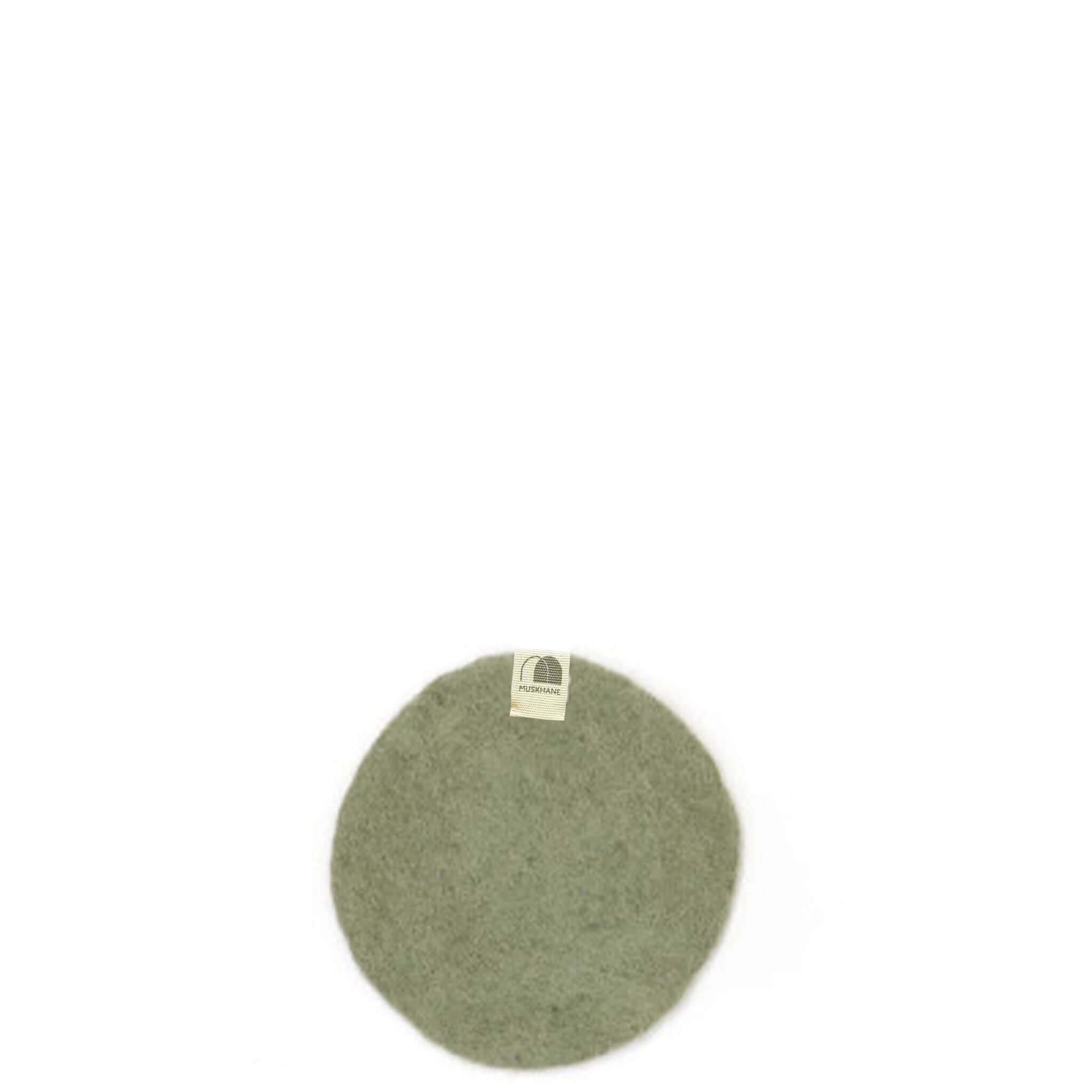 Muskhane Felt Plain Round Coaster - Sage in a round shape, made of 100% felt and fairtrade, handmade in Nepal.