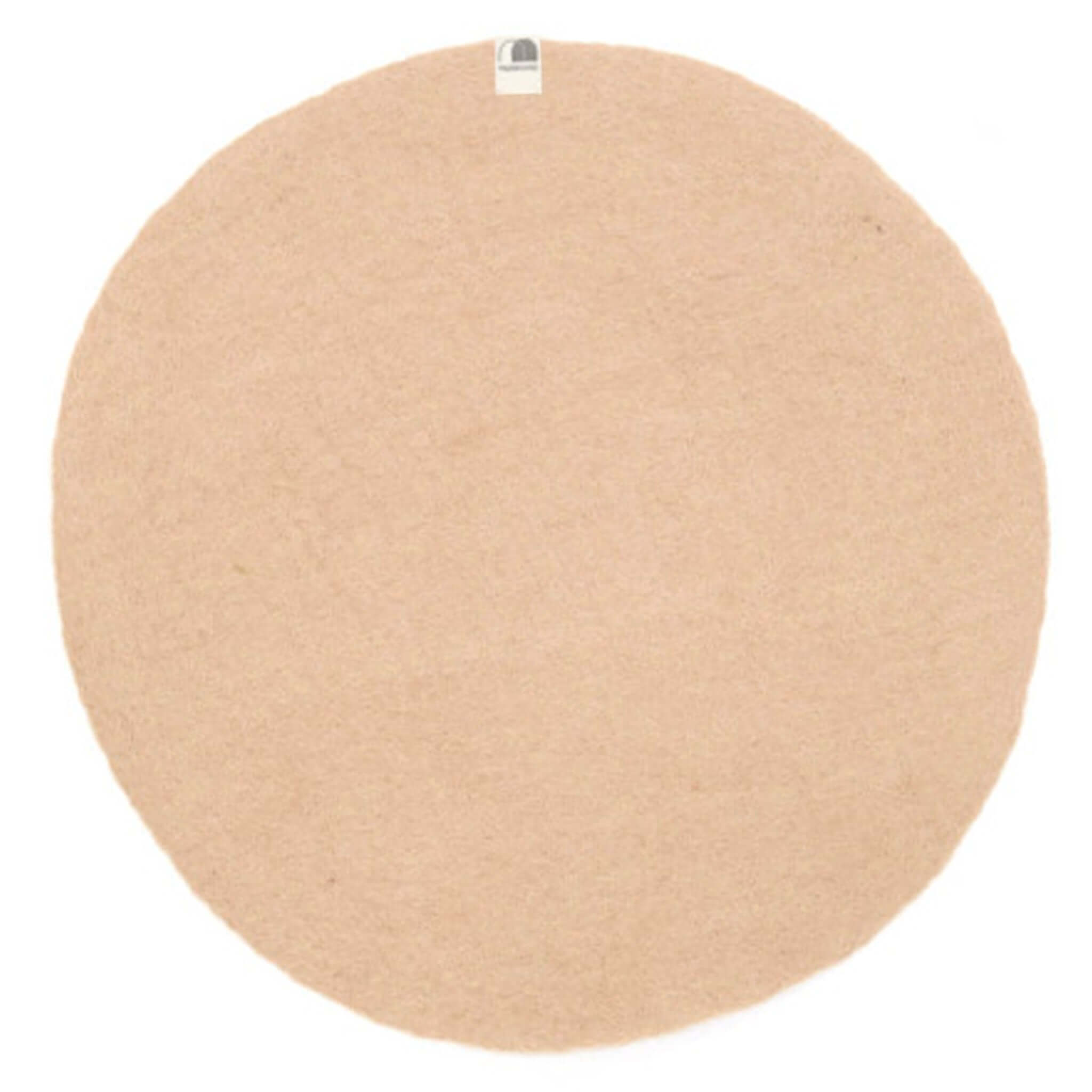Muskhane Felt Plain Round Placemat - Nude Large on a white background, showcasing its soft felt texture.