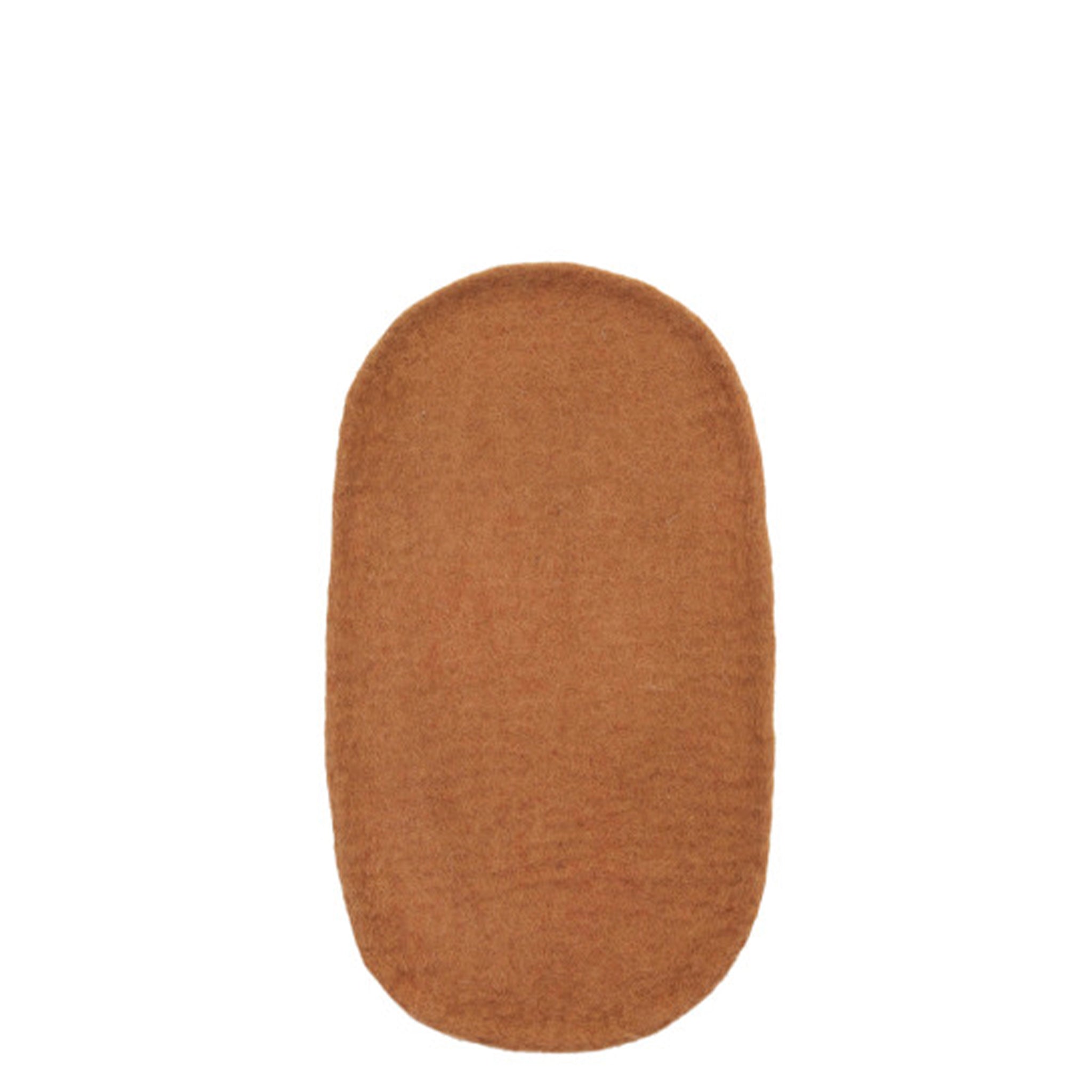 Brown oval trinket tray on a white background