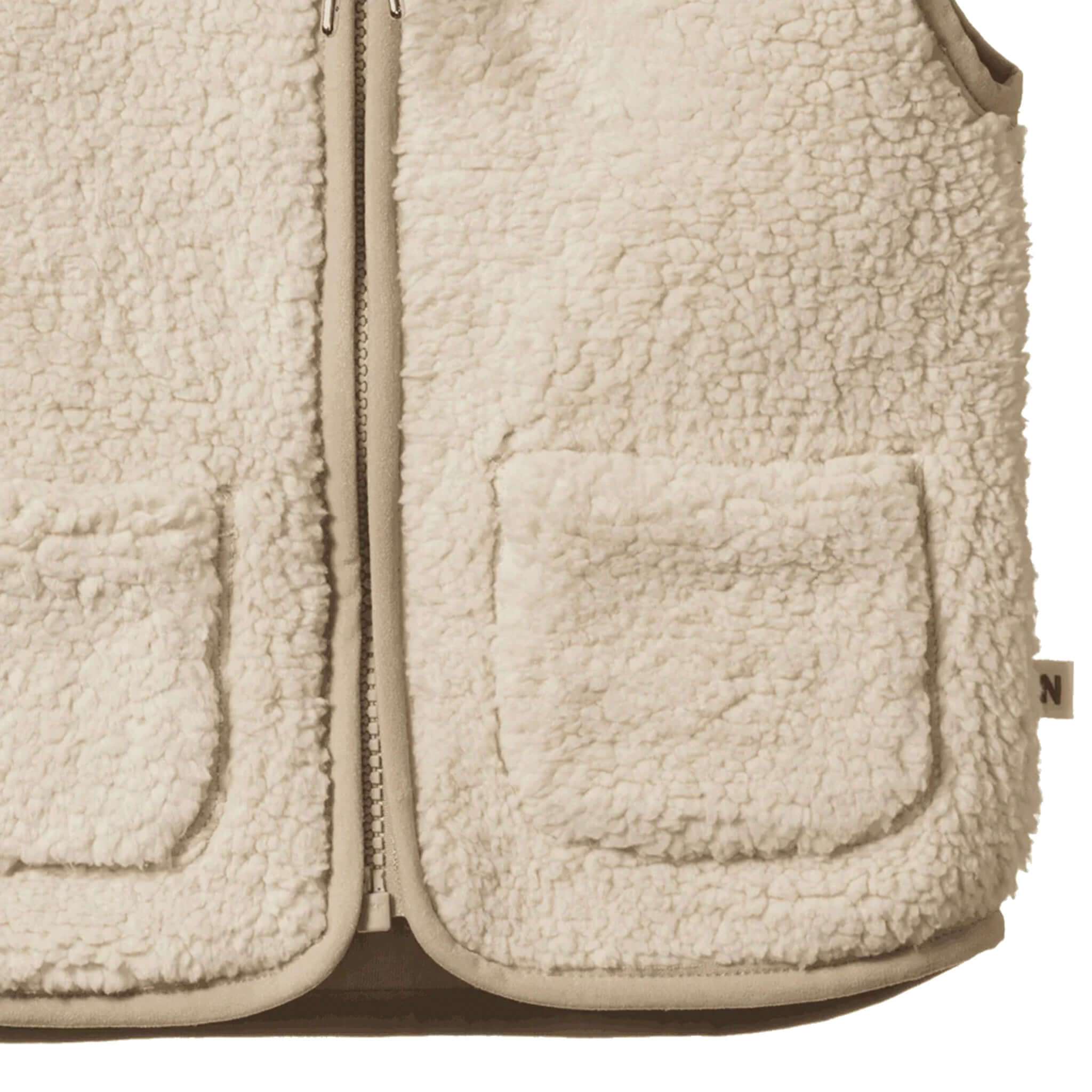 Alt Tag: Nature Baby Flint Vest - Oatmeal recycled polyester sherpa vest in cream with YKK zip front and patch pockets