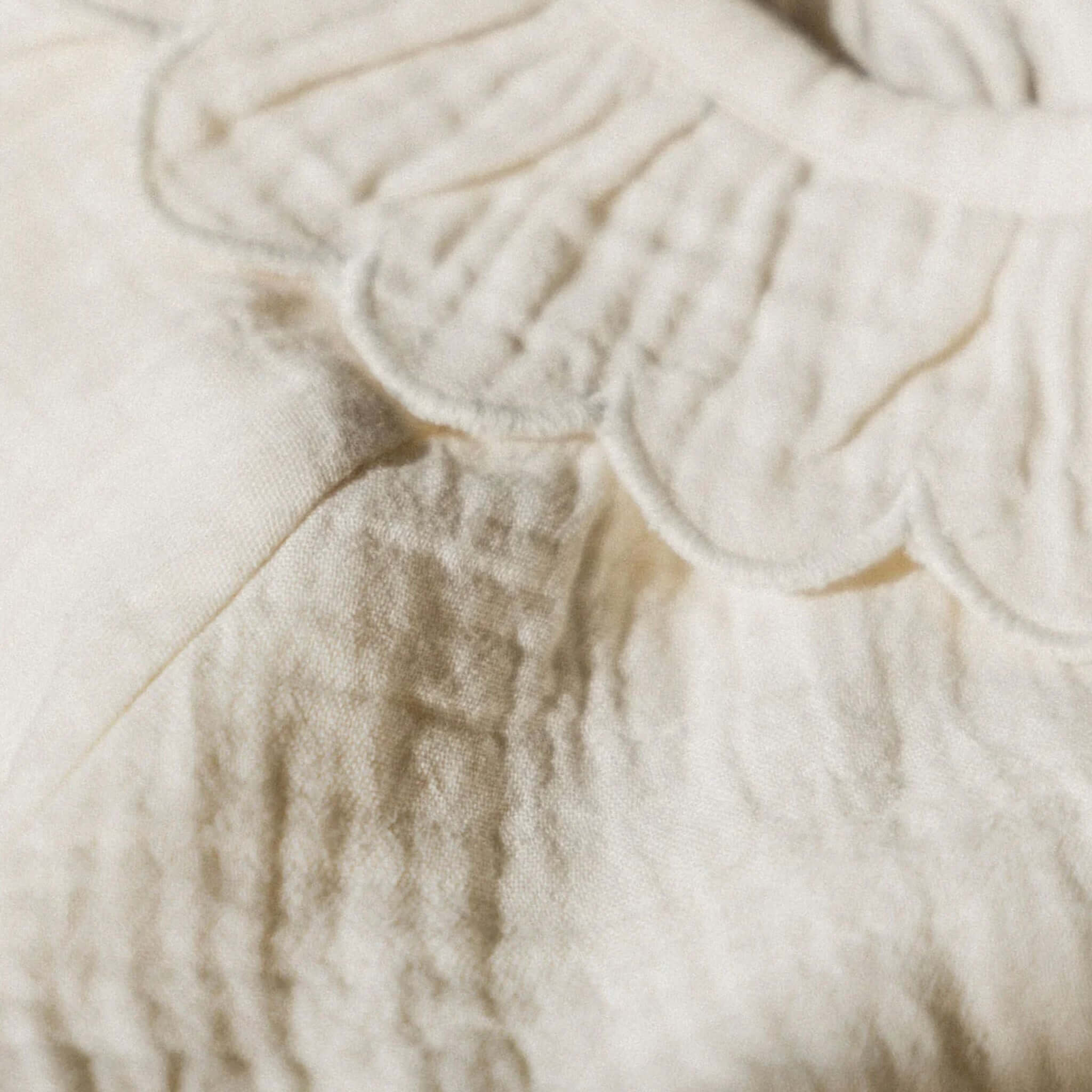 Nature Baby Organic Cotton Ruffle Cameron Blouse - Natural showing scalloped ruffle collar detail on soft fabric.