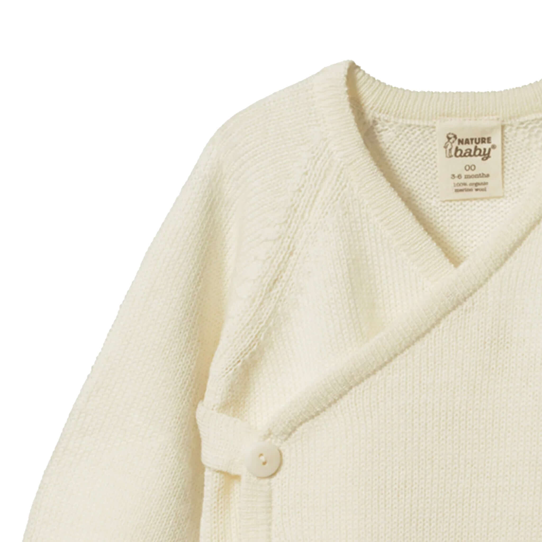 Alt Tag: Nature Baby Organic Merino Knit Kimono Jacket - Natural organic merino wool newborn wrap cardigan in natural with button closure