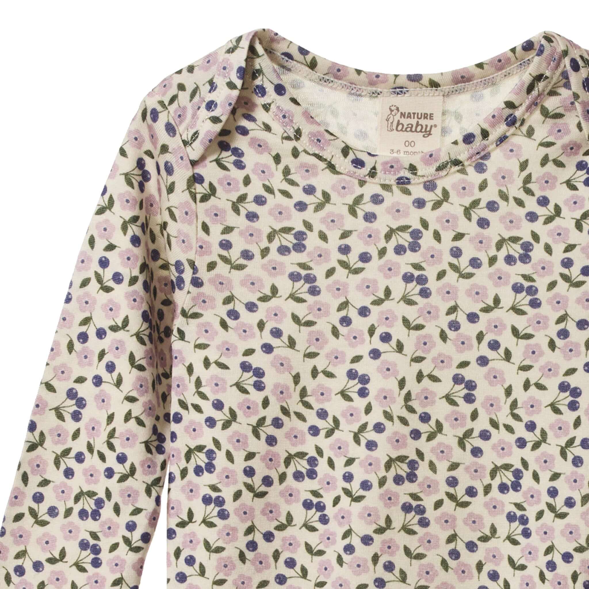 Alt Tag: Nature Baby Organic Merino Long Sleeve Bodysuit - Briarwood Lilac floral print long sleeve baby bodysuit in organic merino wool