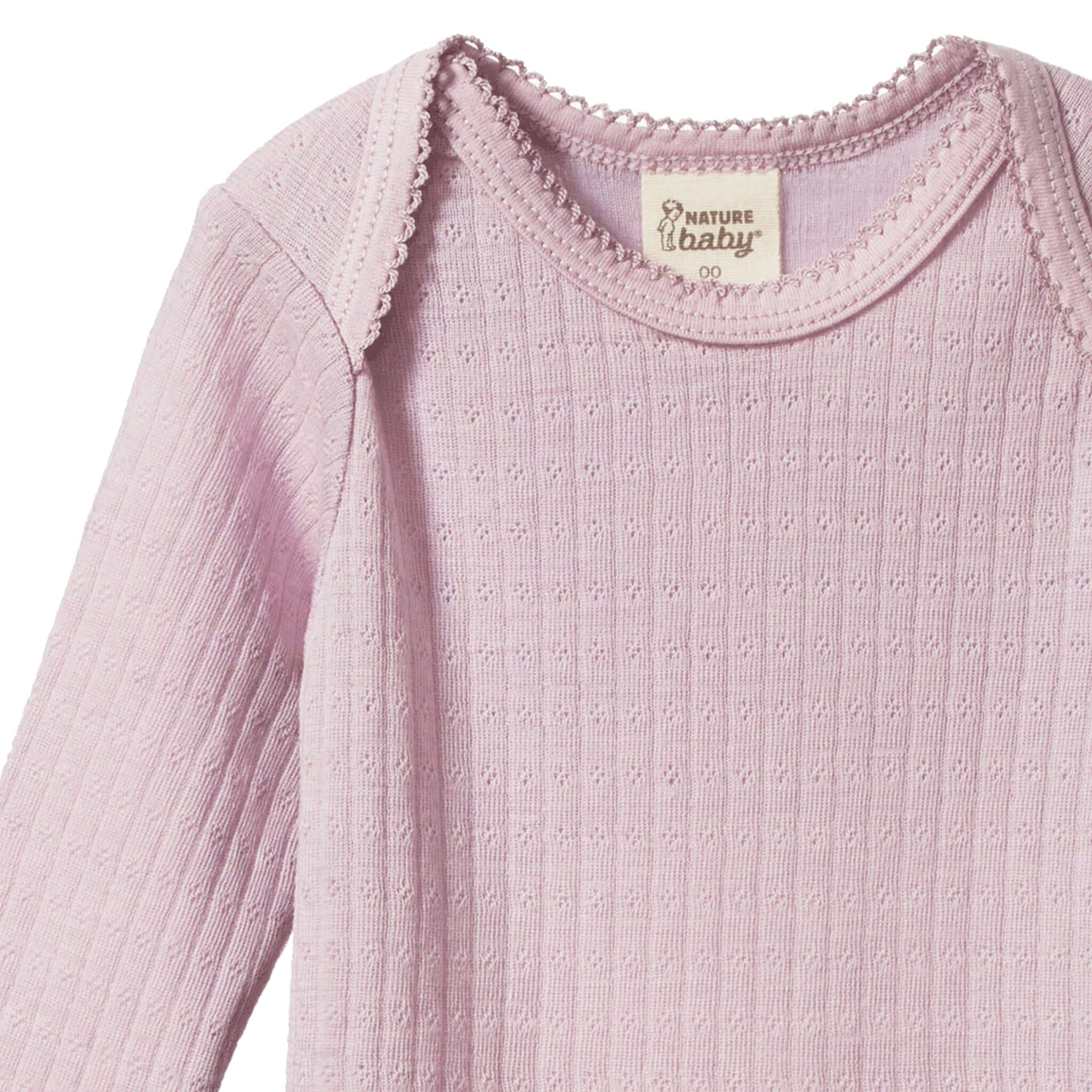 Alt Tag: Nature Baby Organic Merino Long Sleeve Bodysuit - Pointelle Lilac newborn organic merino wool bodysuit, soft pointelle knit long sleeve