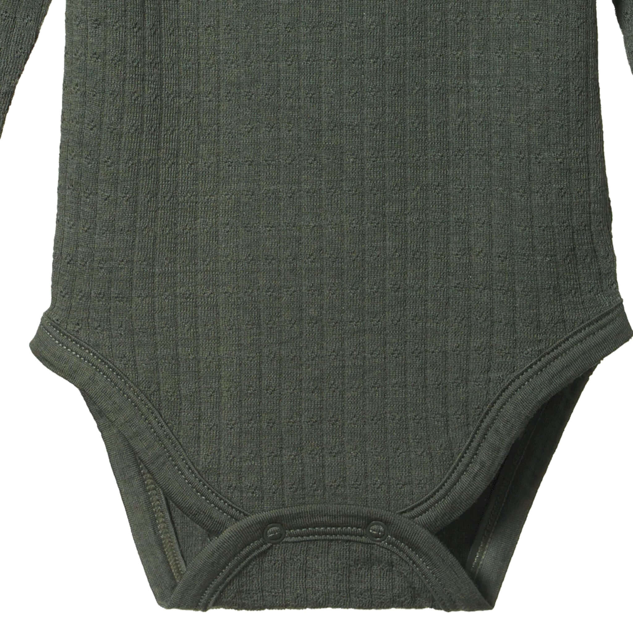 Alt Tag: Nature Baby Organic Merino Long Sleeve Bodysuit - Pointelle Thyme close-up of organic merino pointelle fabric and snap crotch