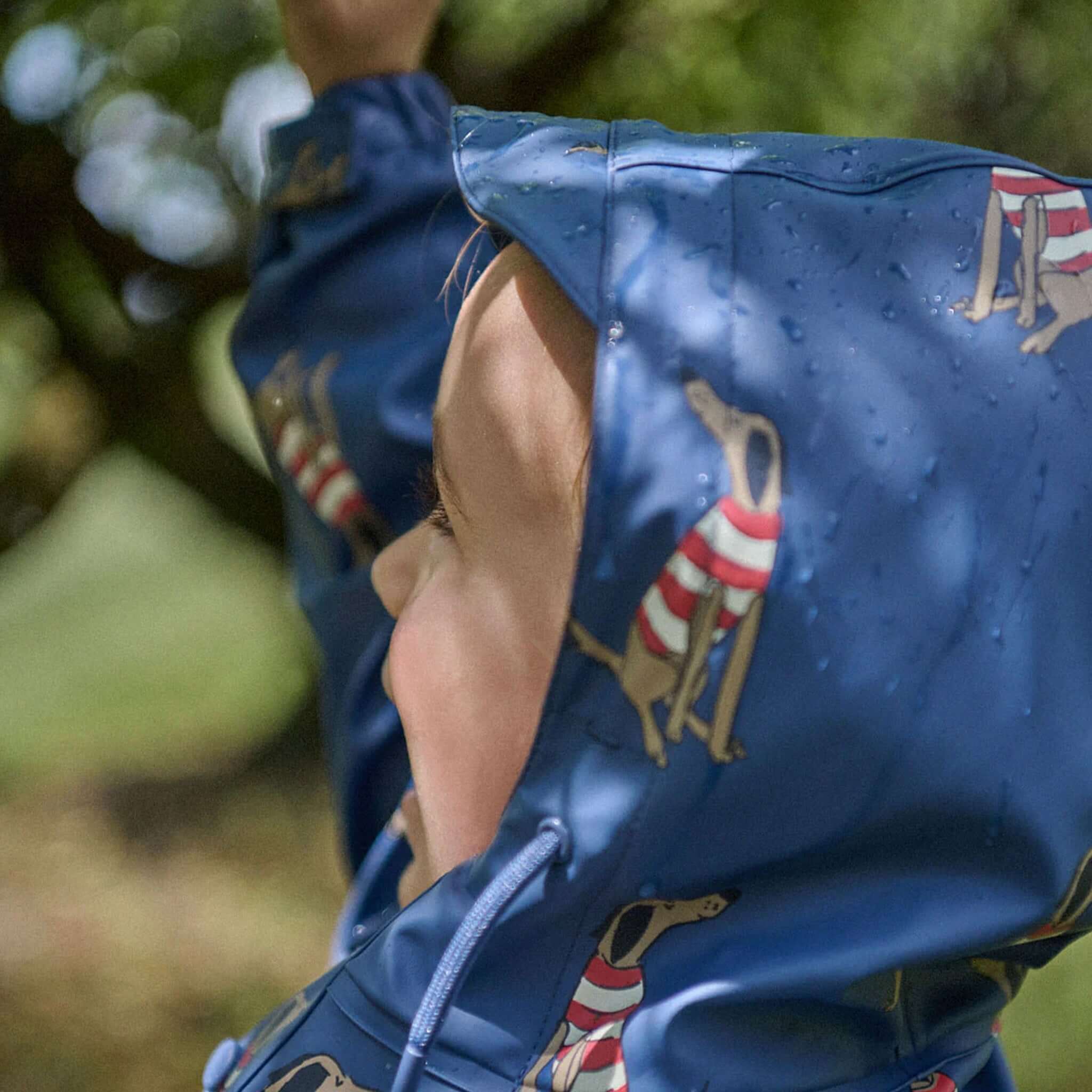 Alt Tag: Nature Baby Raincoat - Best Friend Indigo hooded kids raincoat, water-resistant recycled fabric with organic cotton lining