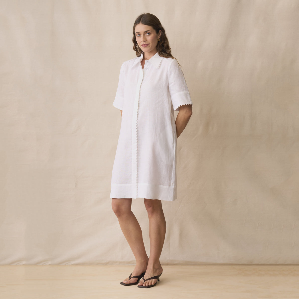 Neris Rikki Dress - White, 100% linen shirt dress with ric-rac trim, worn by a model front view