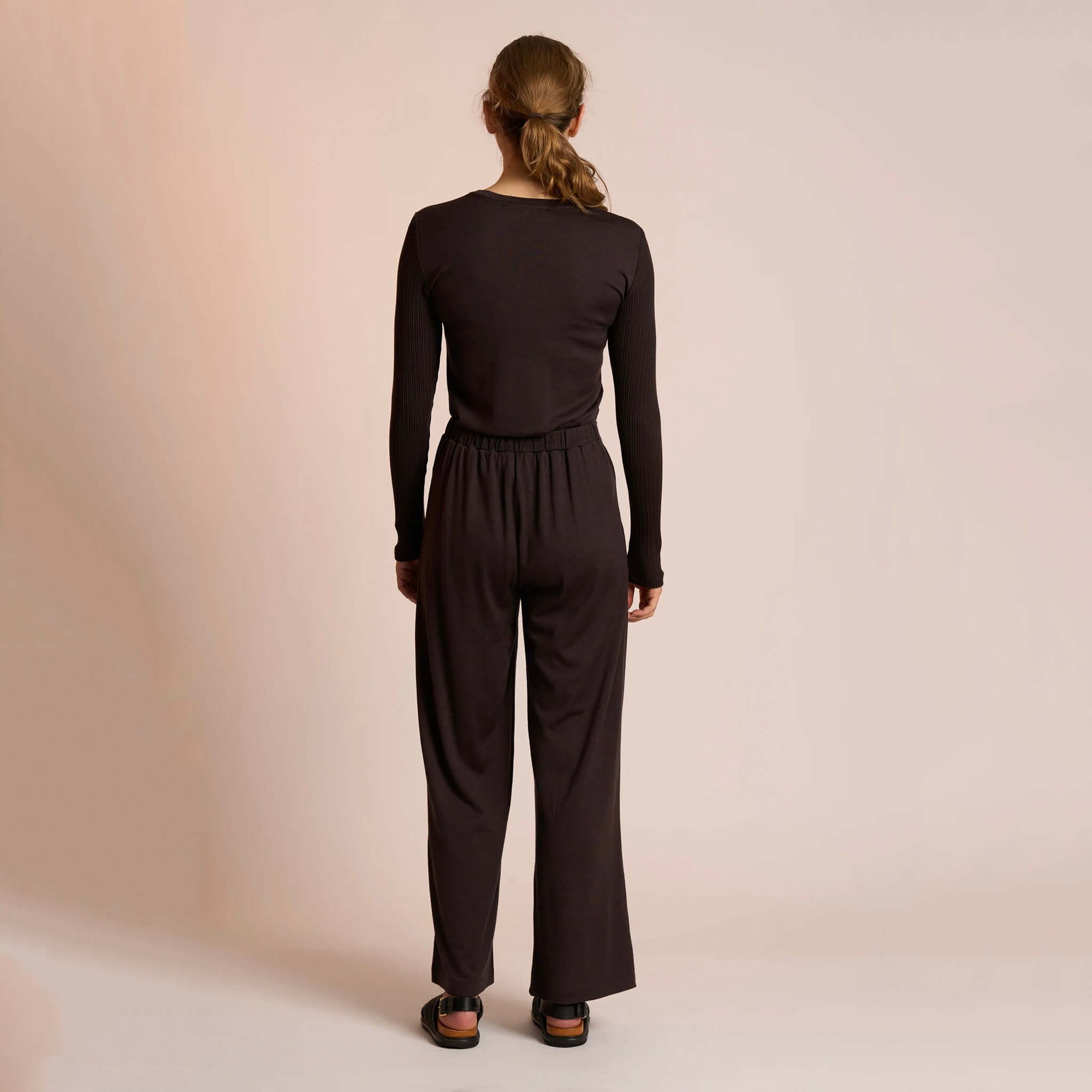 Alt Tag: Neris Merino Lounge Pants - Bitter Sweet back view, 100% merino wool lounge trousers with elasticated waist