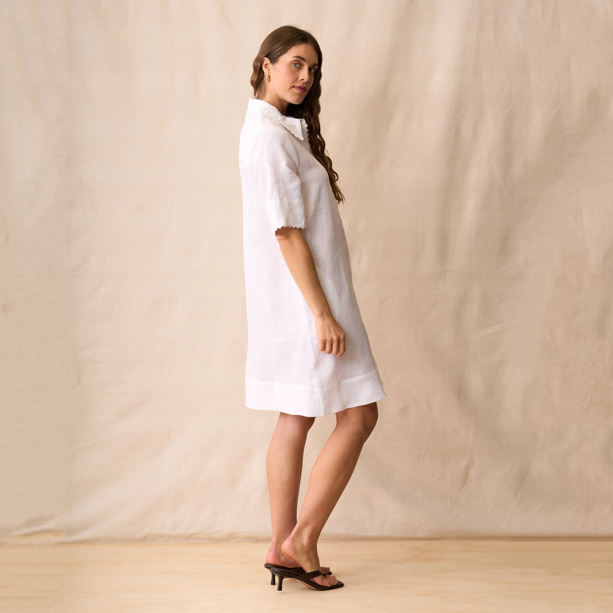 Neris Rikki Dress - White worn by a model, side view