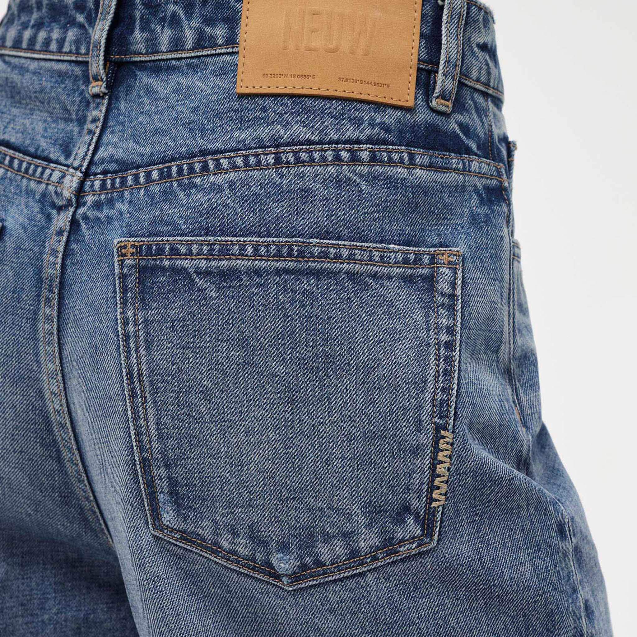 Alt Tag: Neuw Coco Relaxed Psych Jeans - Mid Vintage Indigo back pocket detail, high-rise relaxed straight denim in mid vintage indigo wash
