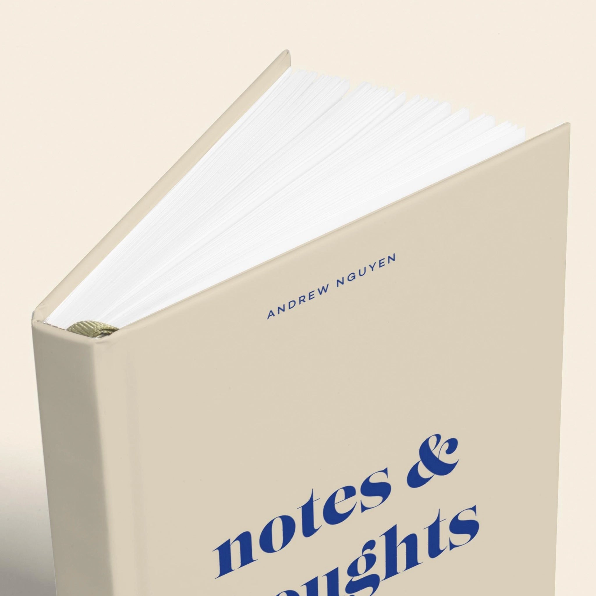 Book titled 'notes & thoughts' by Andrew Nguyen on a beige background