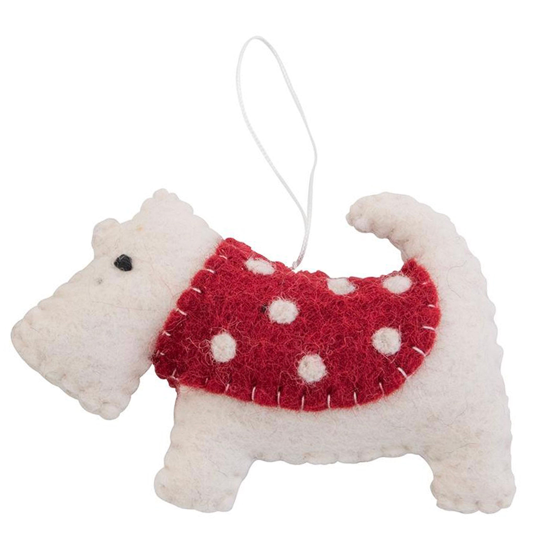 White dog-shaped ornament with a red polka dot sweater on a white background