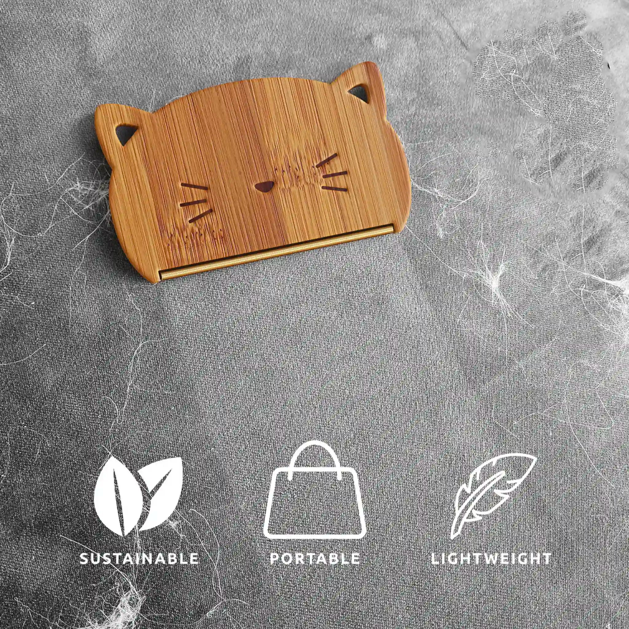 Wooden cat-shaped cardholder on a textured gray background with sustainability icons below.