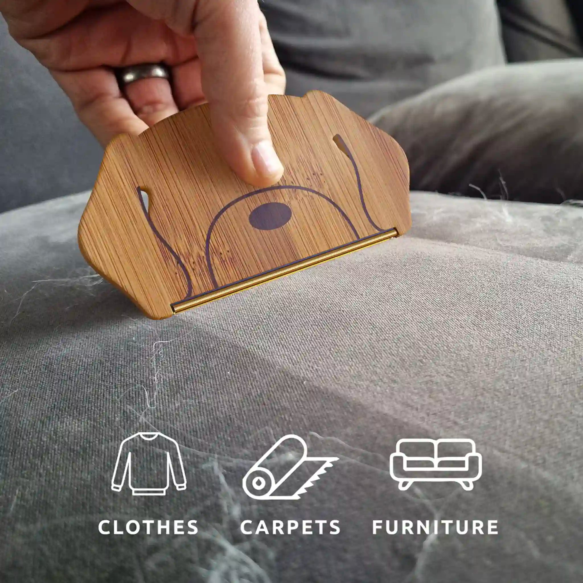 Wooden scuff tester being used on a fabric surface with icons indicating its use on clothes, carpets, and furniture.