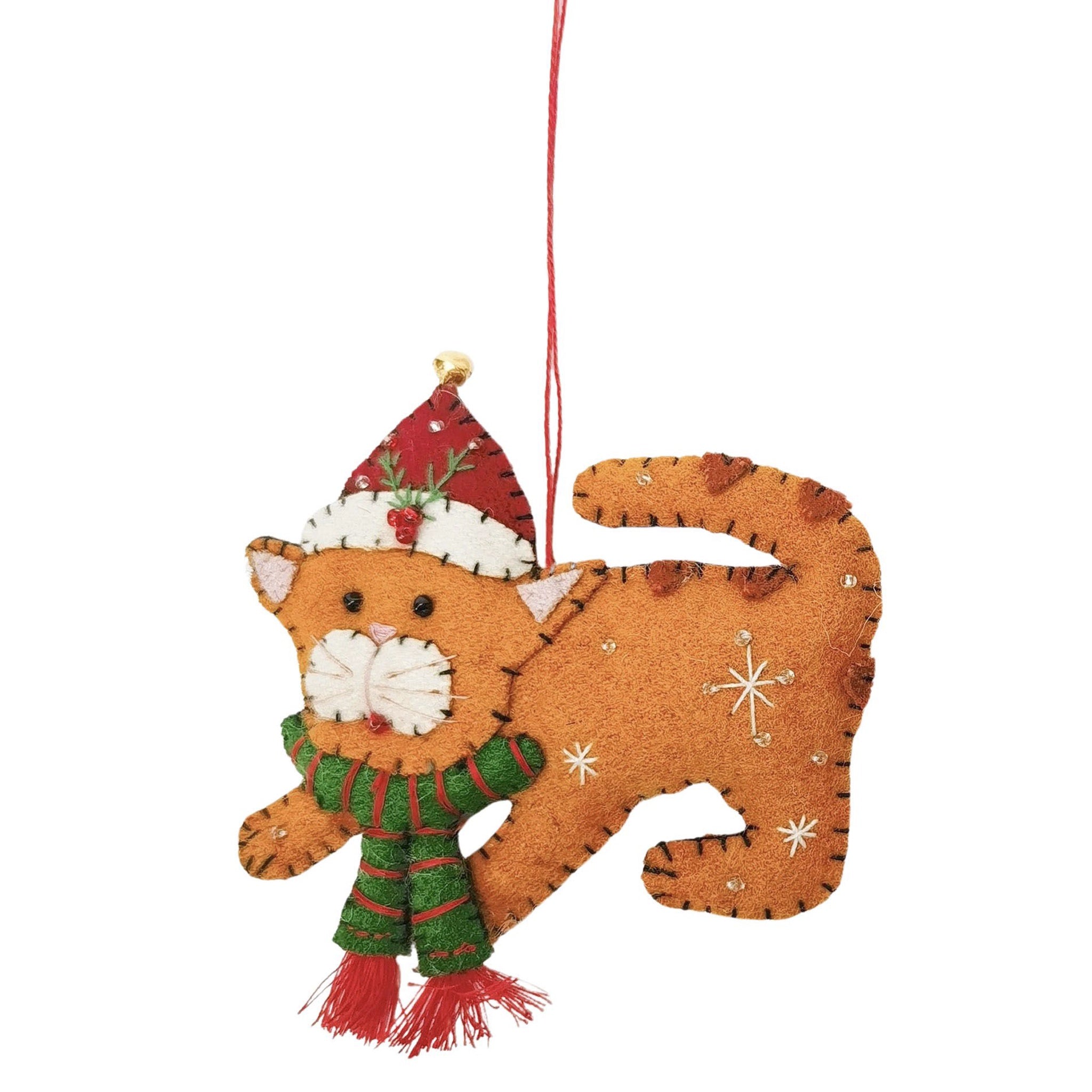 Cat-shaped Christmas ornament with a red hat and green scarf on a white background