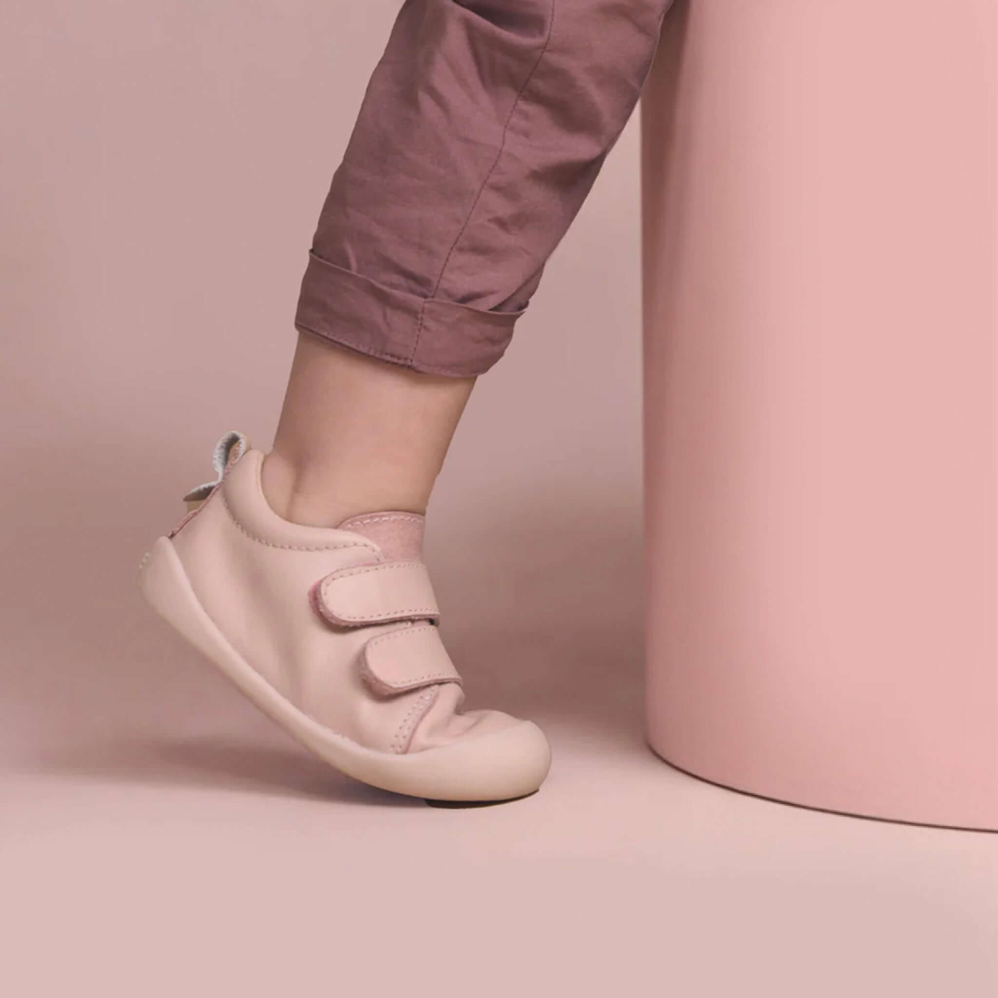 Alt Tag: Pretty Brave Toto Baby Sneakers - Dusky Pink on toddler foot, soft premium leather first-walker shoes with flexible sole