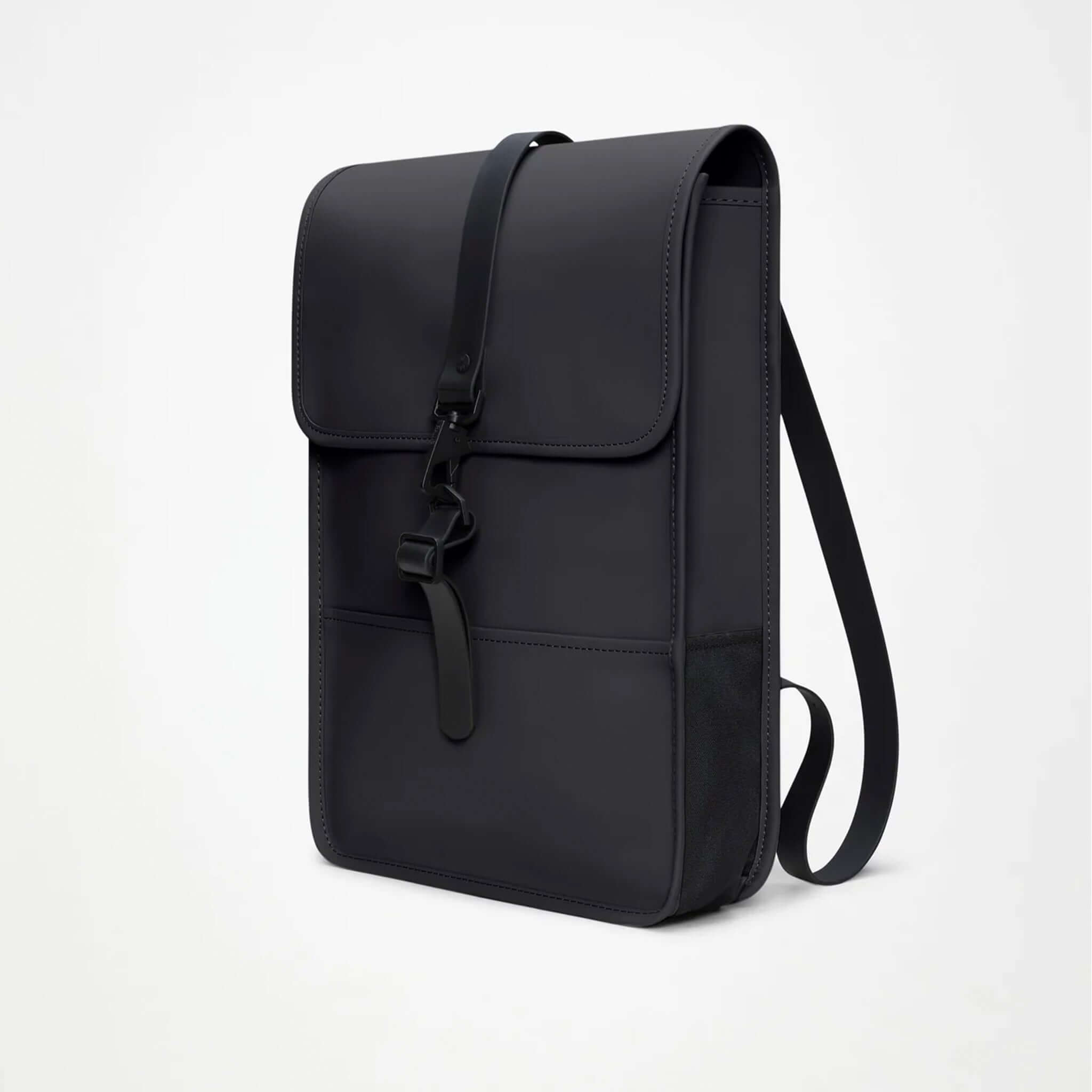 Rains Backpack Mini - Black, compact design, flap closure, perfect for commuting with a 15" laptop pocket.