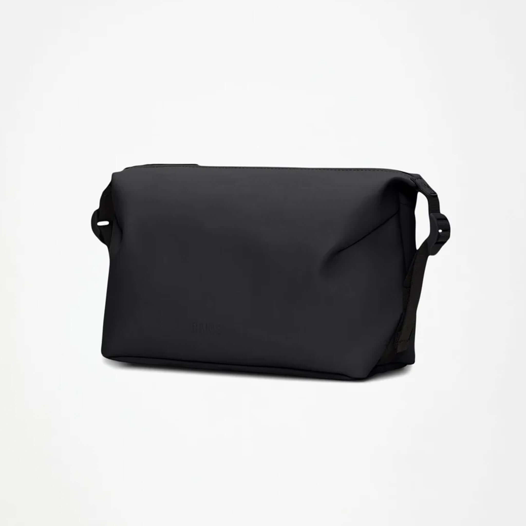 Rains Wash Bag Small - Black, spacious waterproof toiletry bag for travel essentials.