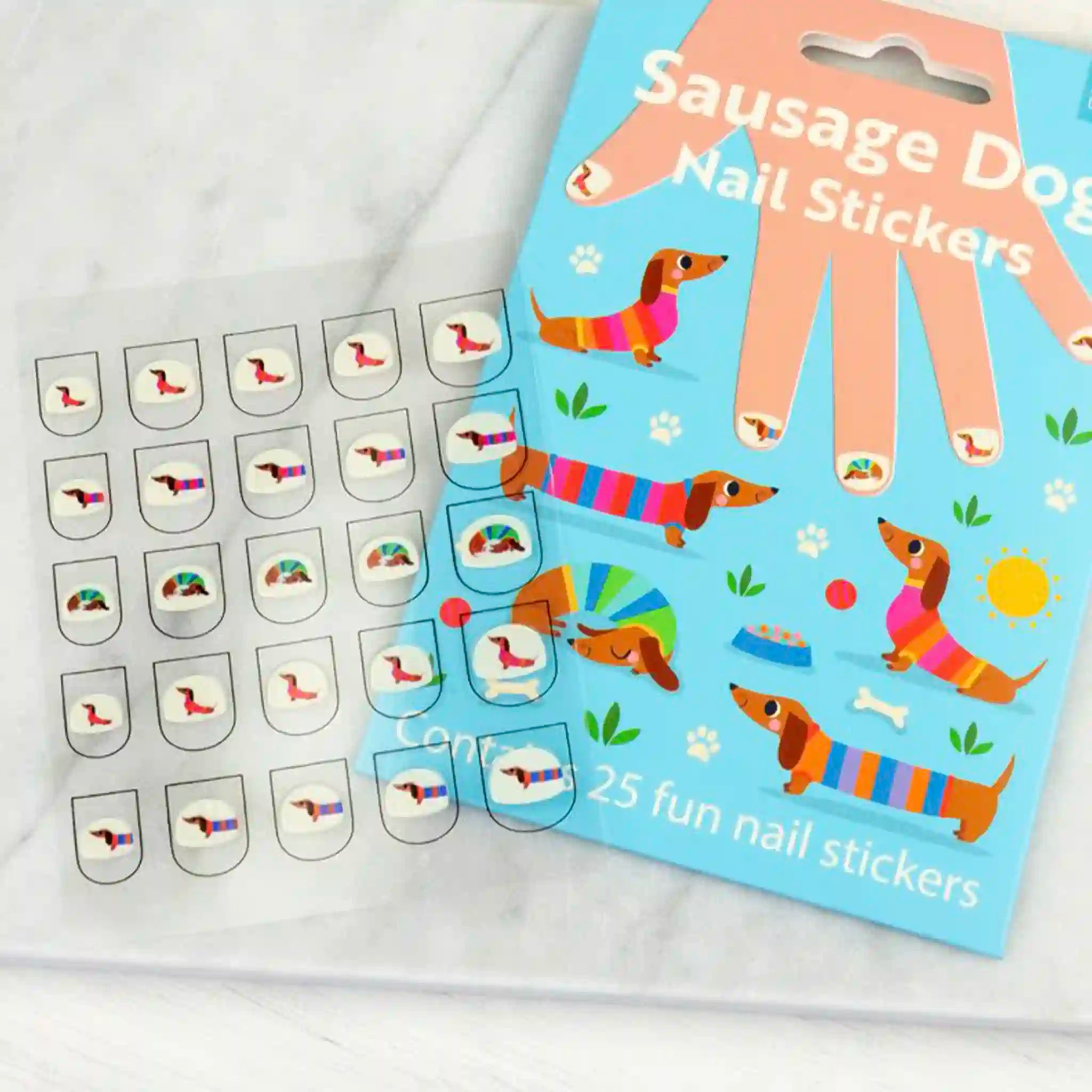 Sausage dog nail stickers with packaging on a white background