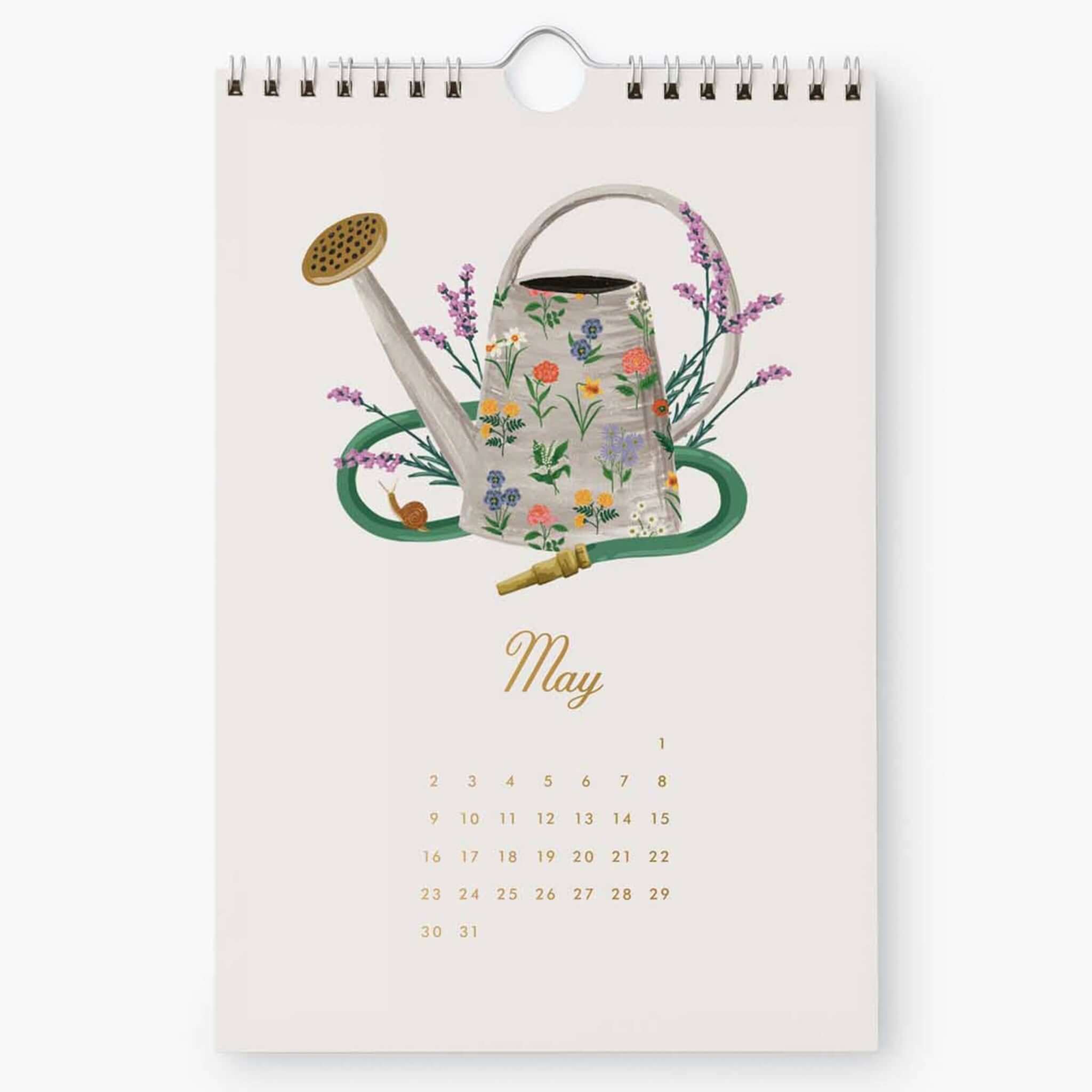Rifle Paper 2027 Kitchen Calendar - Garden Study May page featuring a watering can surrounded by flowers.