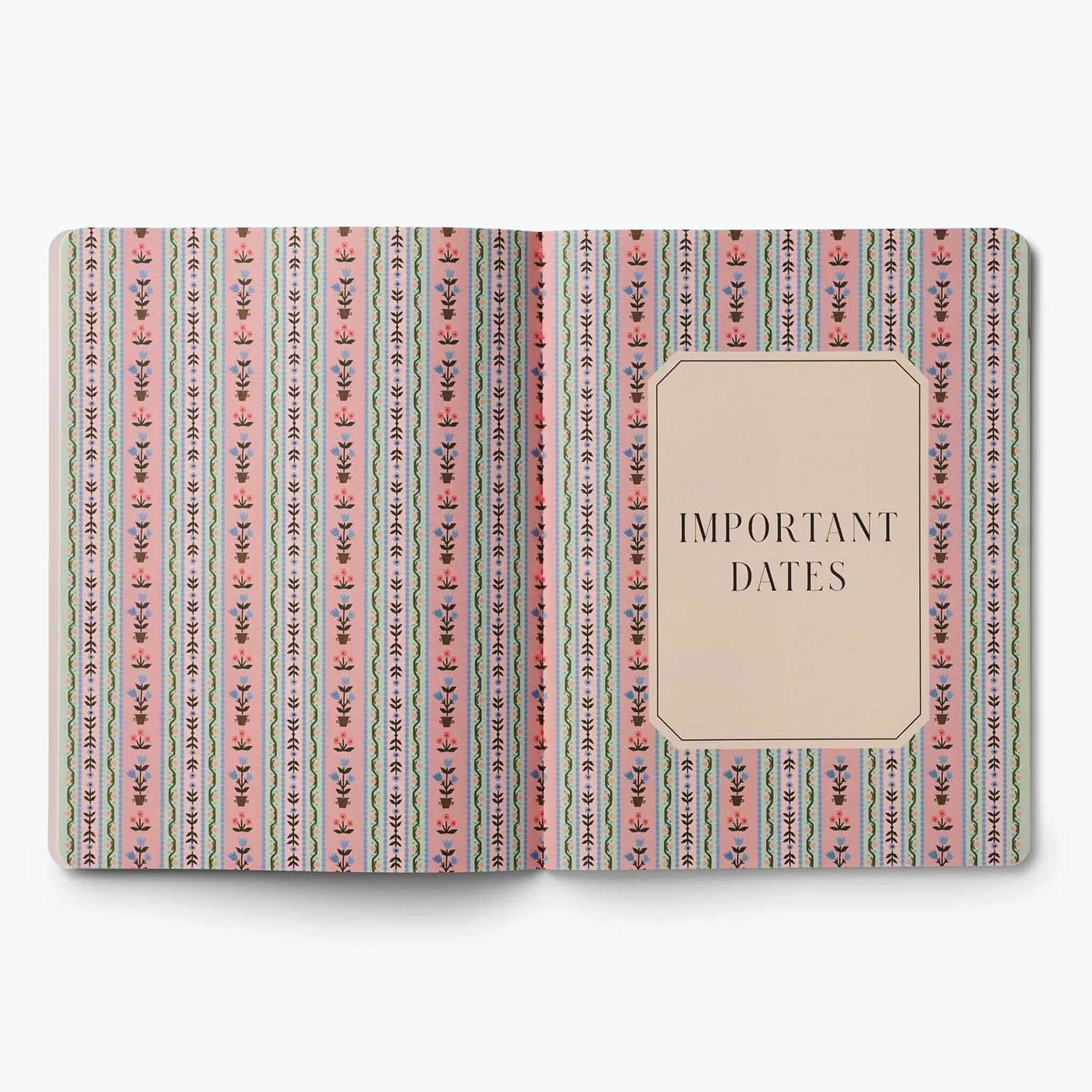 Rifle Paper 2027 Monthly Appointment Notebook - Ladies Night Book Club open to important dates page with floral design.