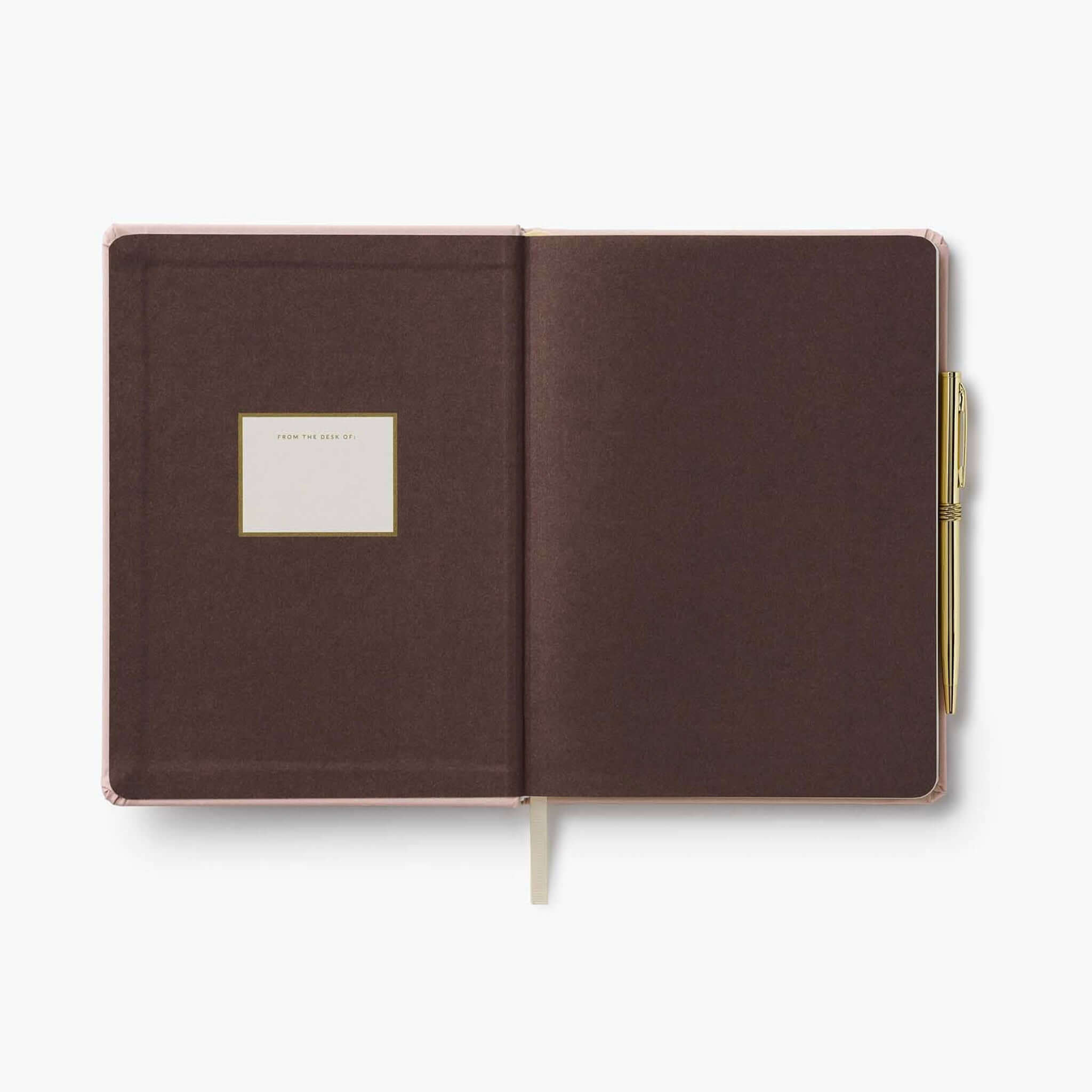 Interior view of the Rifle Paper 2027 Weekly Hardcover Planner with Pen - Paisley showing the cover and gold pen.