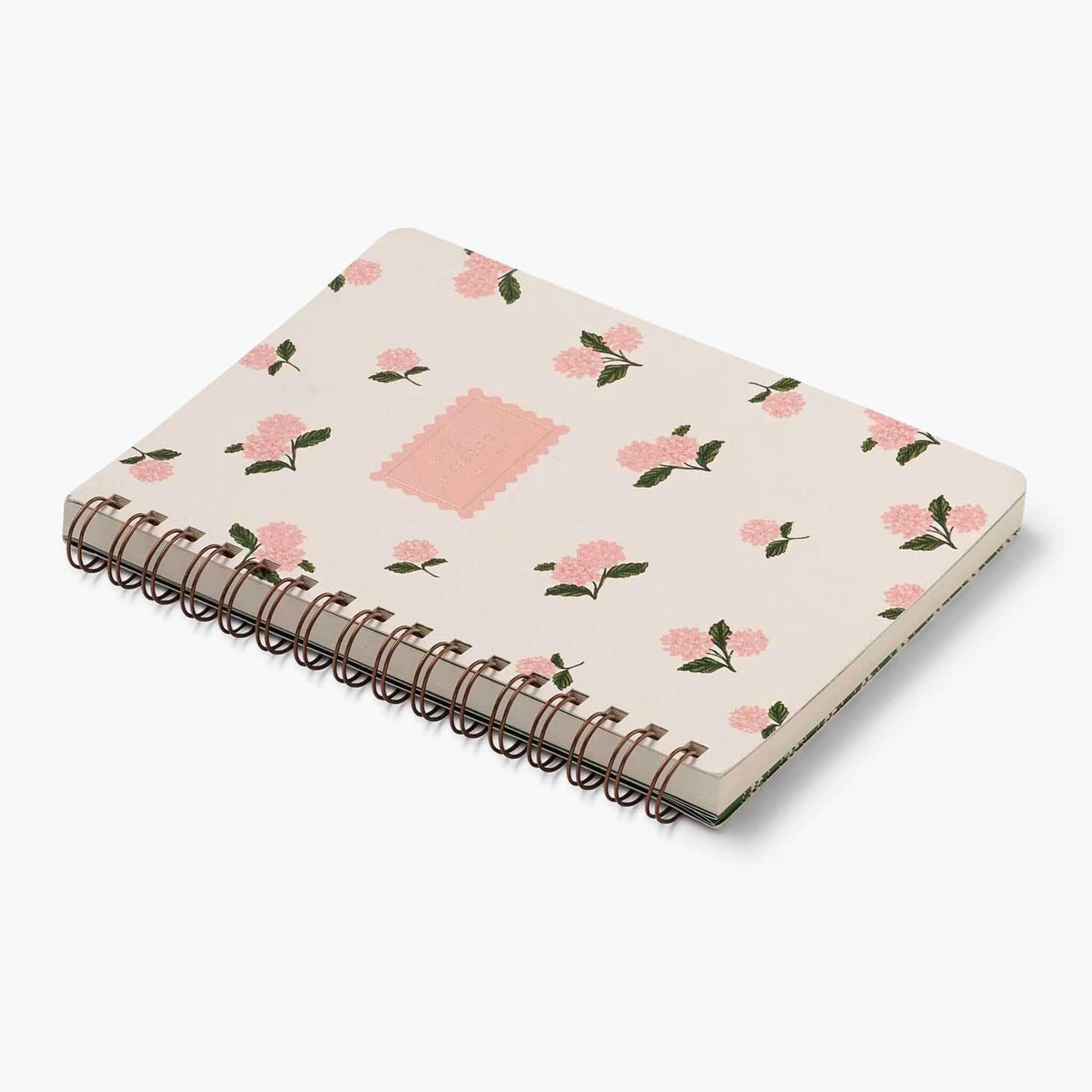 Rifle Paper US Spiral Notebook - Pink Hydrangea with soft pink floral design and rose gold spiral.