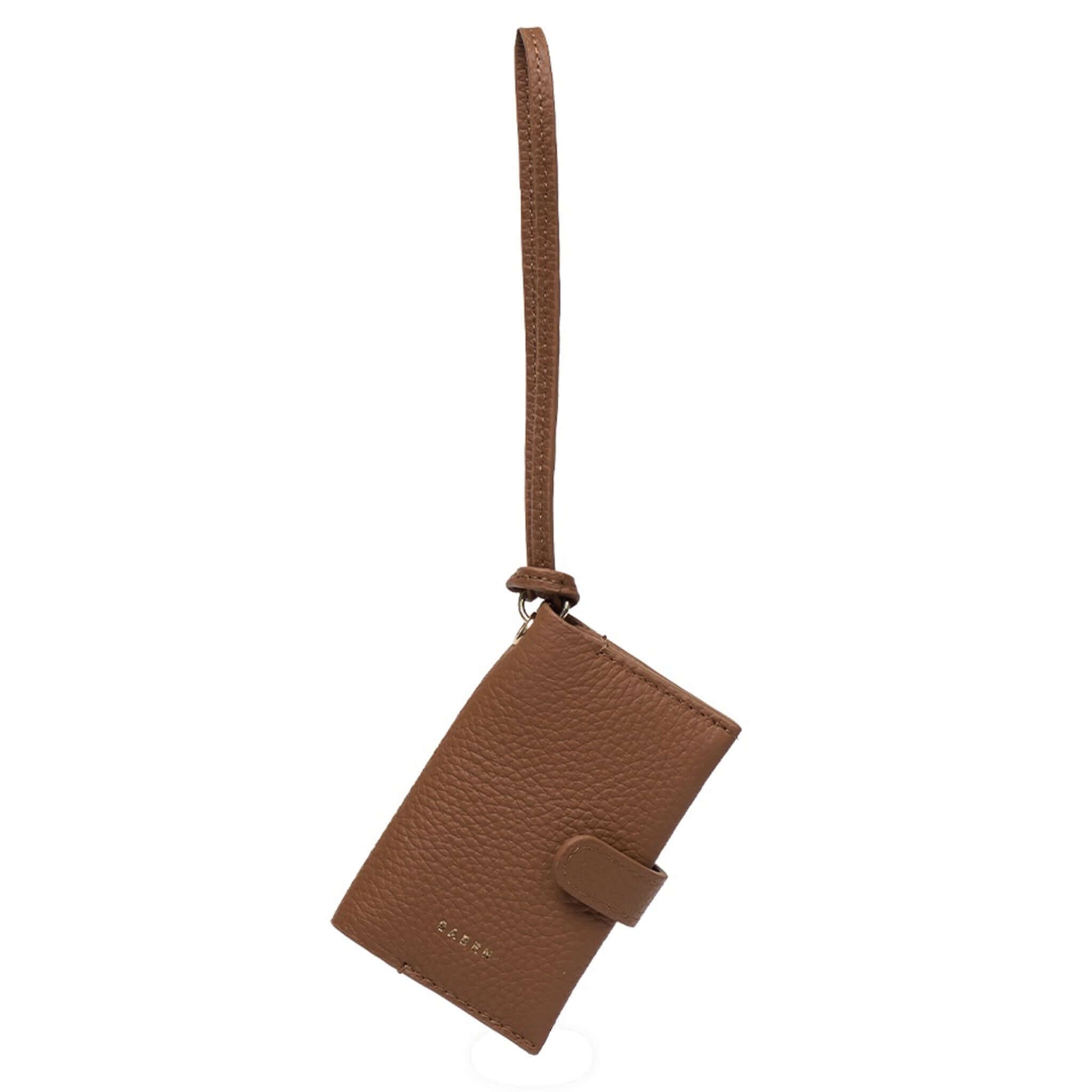 Saben Sid Card Holder - Tan in soft pebble leather, featuring a wristlet strap and secure snap closure for organization.