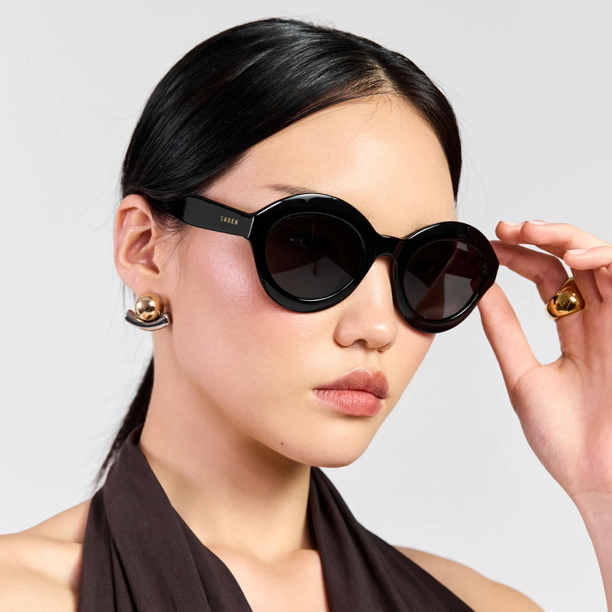 Saben Eyewear Cosmo Sunglasses in Black - angular cat-eye acetate frames with dark lenses