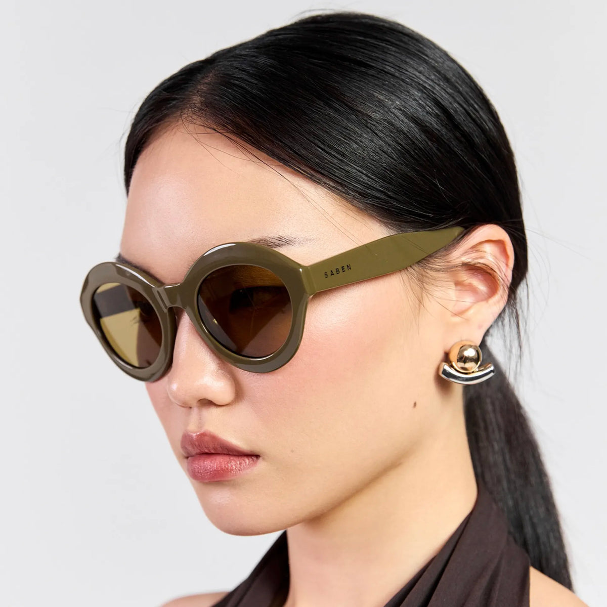 Saben Eyewear Cosmo Sunglasses in Olive - angular cat-eye acetate frames with olive lenses