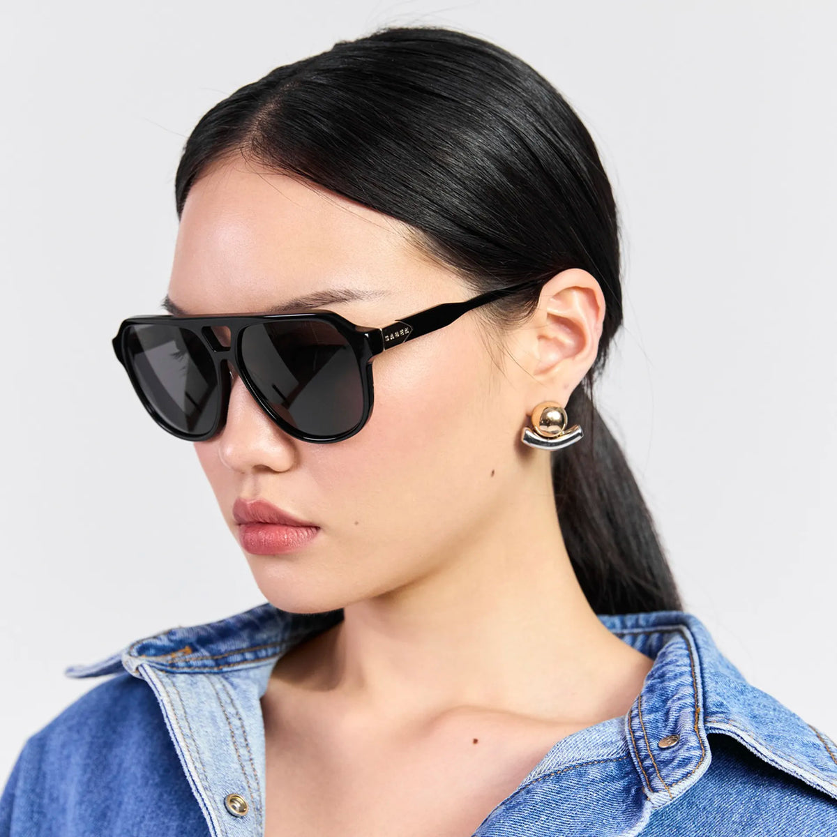 Saben Eyewear Marlo Sunglasses in Black - aviator-style acetate frames with a top bar and dark lenses
