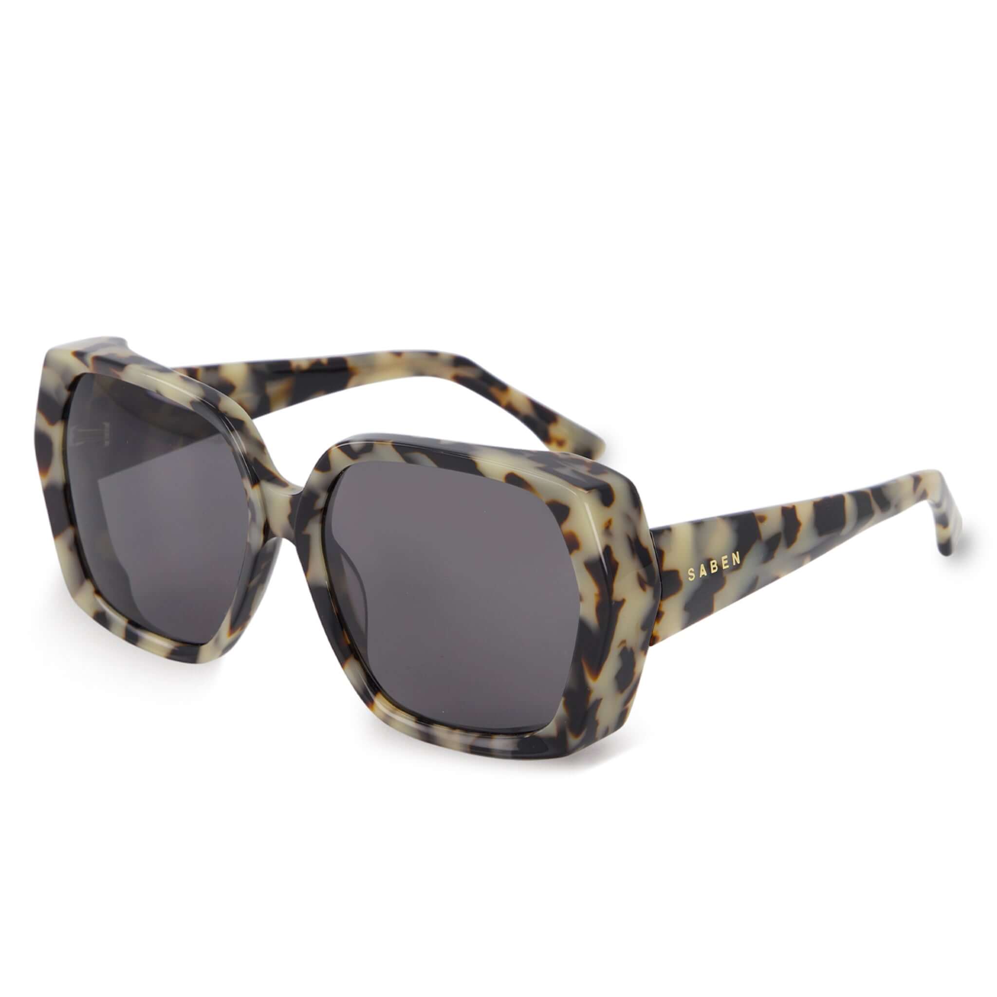 Alt Tag: Saben Eyewear Remi Sunglasses - Light Tortoise oversized hexagonal acetate frame with bevelled edges and dark lenses