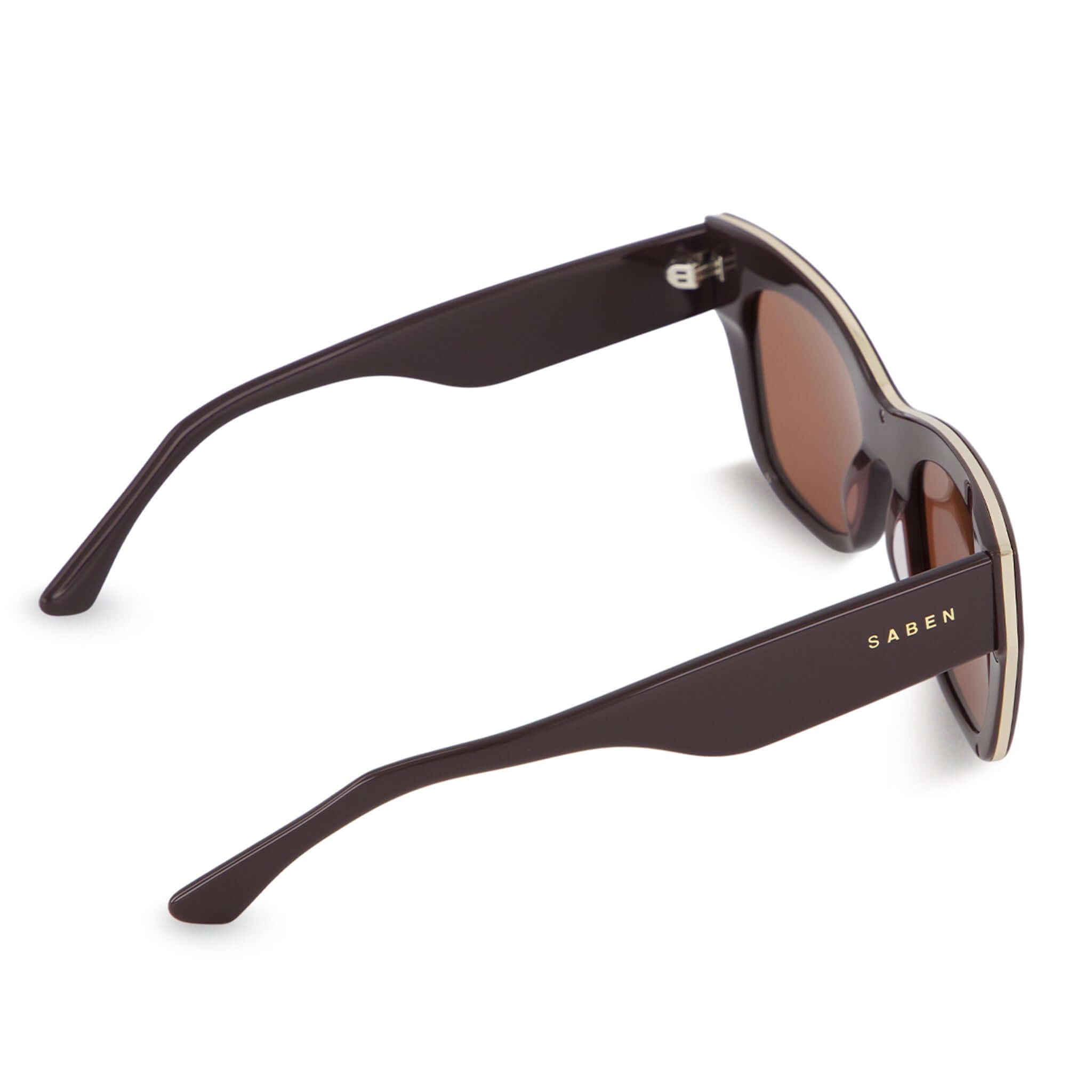 Alt Tag: Saben Eyewear Sloane Sunglasses - Espresso acetate frame sunglasses with pale gold hardware, side view, flattering lifted base frame