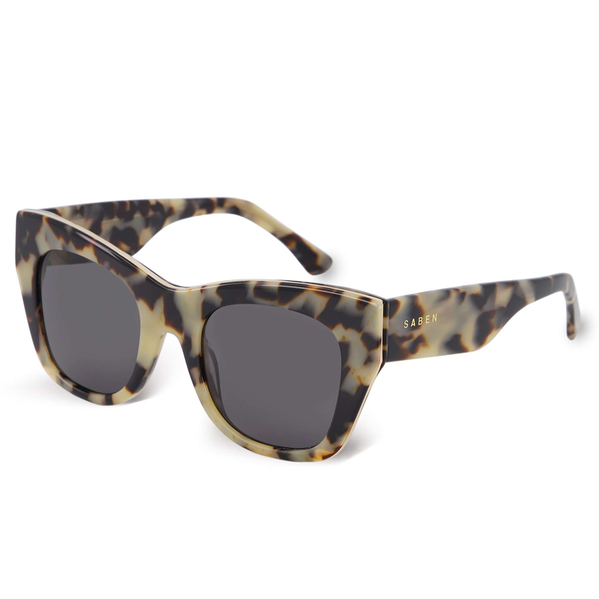 Alt Tag: Saben Eyewear Sloane Sunglasses - Light Tortoise acetate cat-eye sunglasses with pale gold hardware and dark lenses