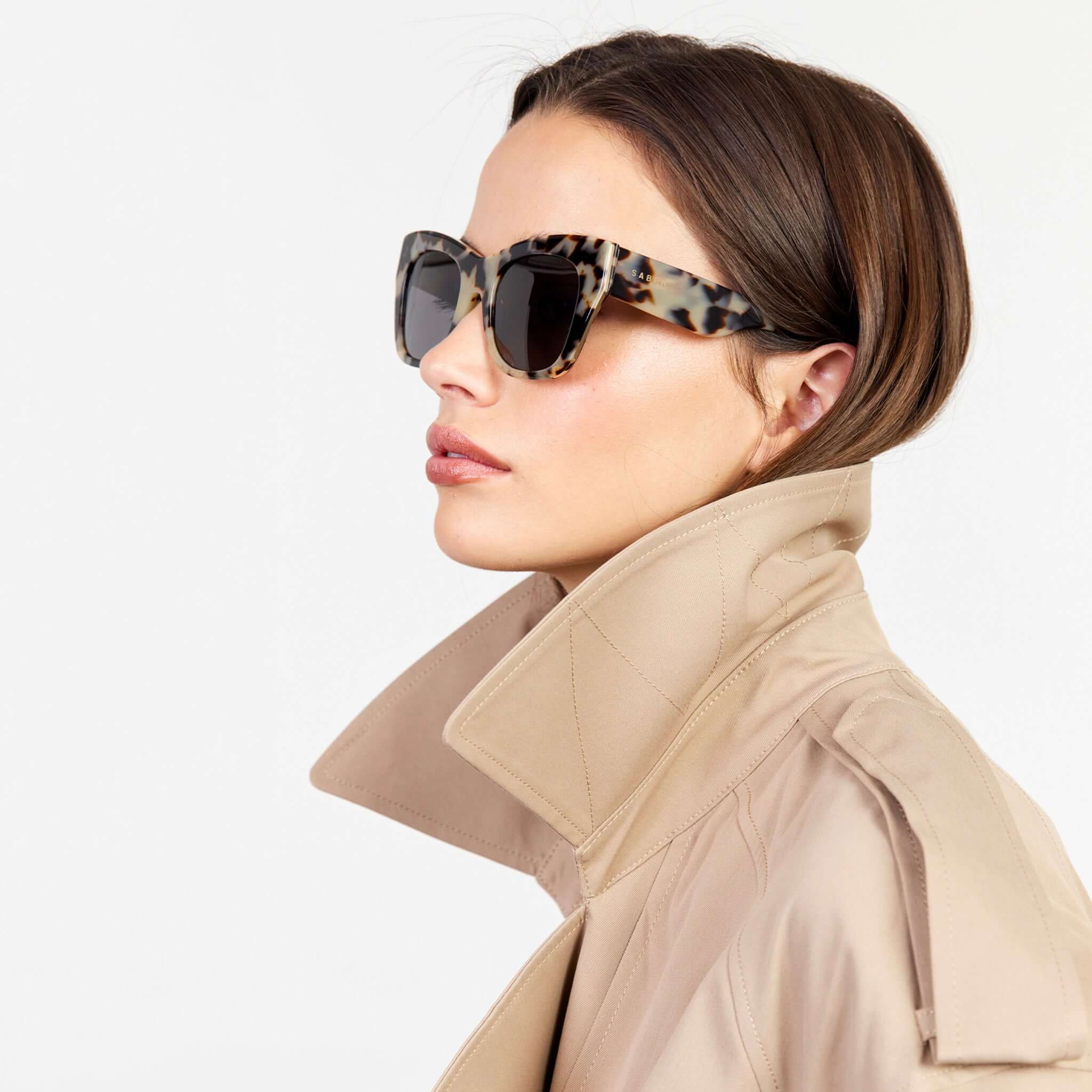 Alt Tag: Saben Eyewear Sloane Sunglasses - Light Tortoise on model, natural acetate frame with pale gold hardware, sculpting fit