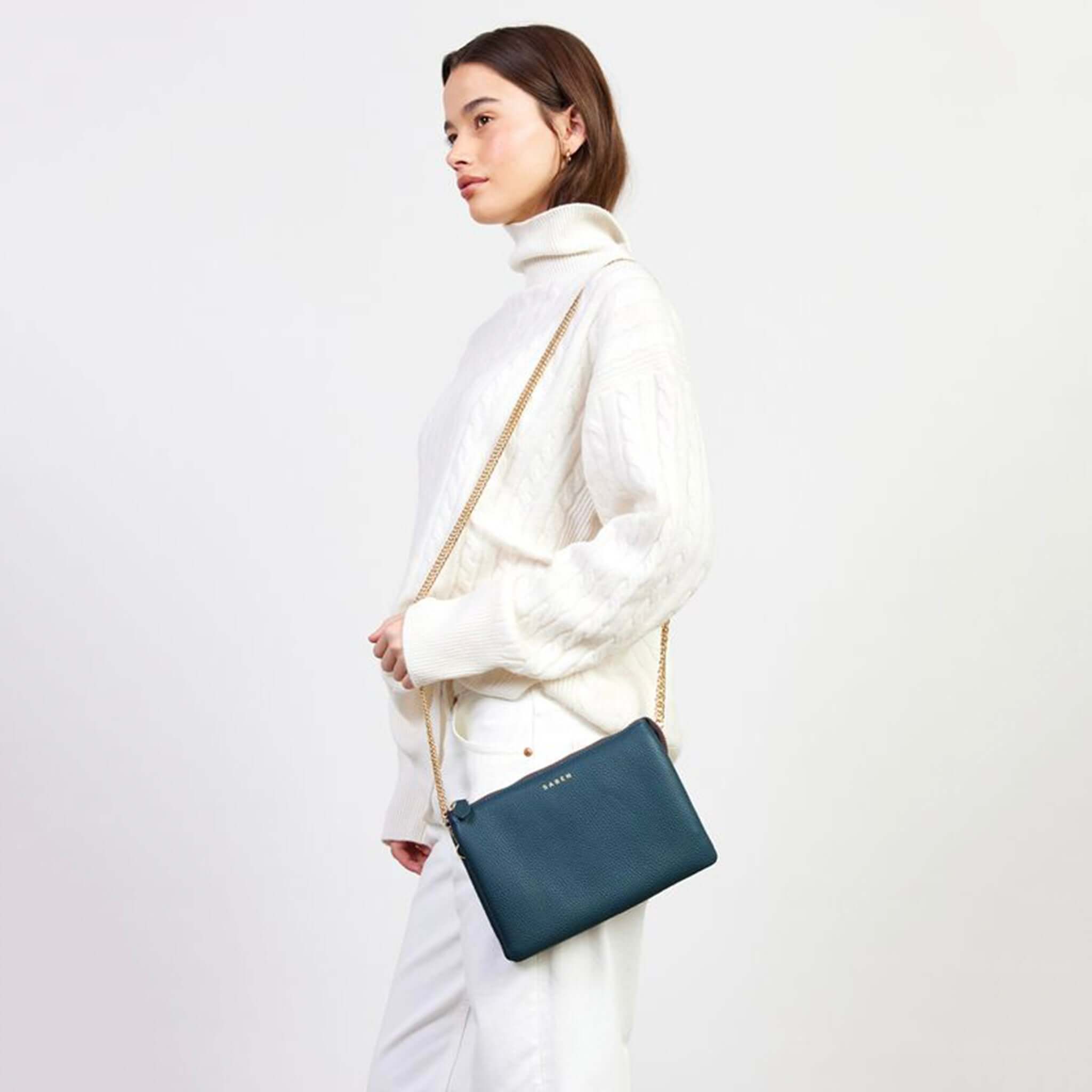 Alt Tag: Saben Feature Chain Strap - Gold Curb worn crossbody on Saben bag, detachable adjustable gold curb chain for hands-free style