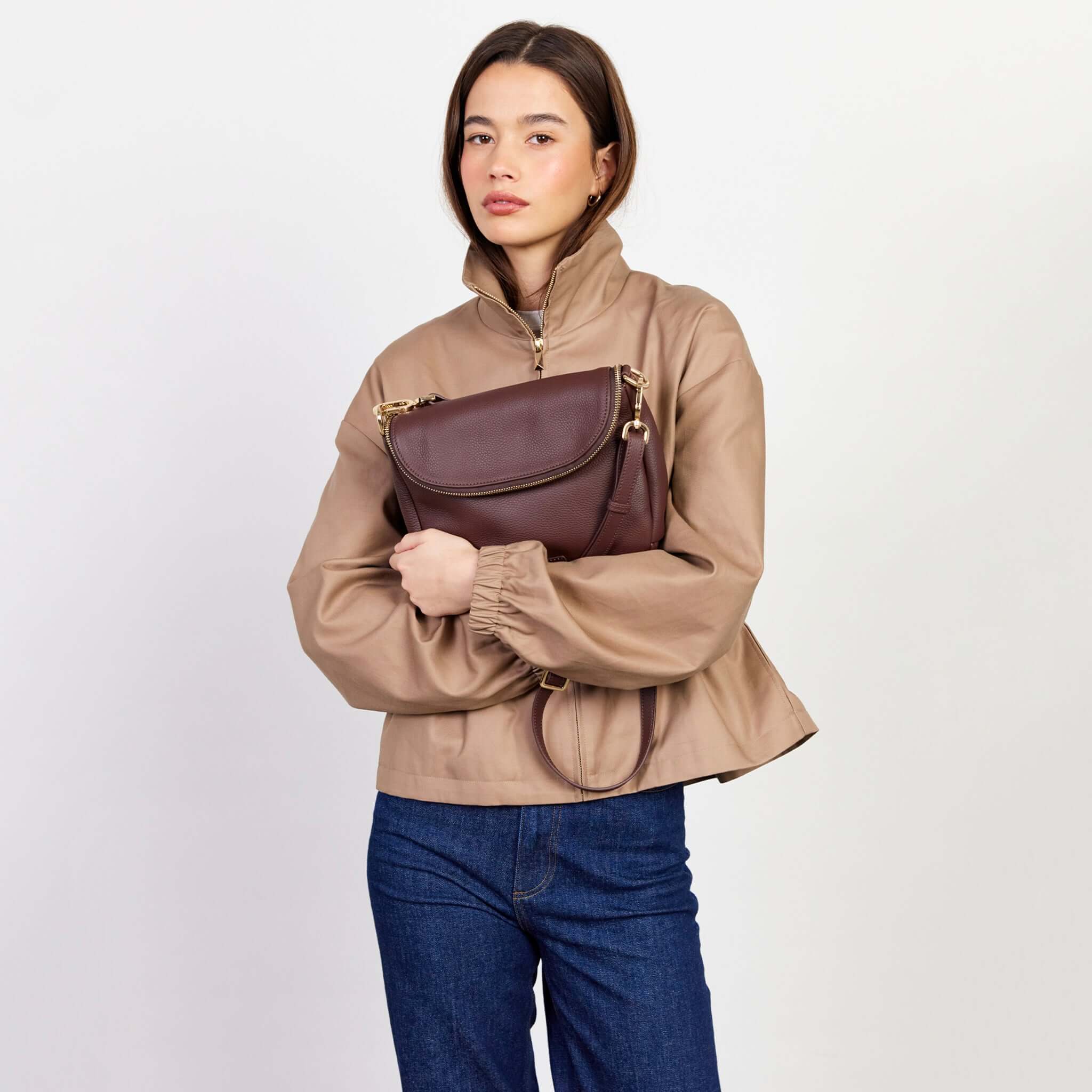 Alt Tag: Saben Fifi Crossbody Bag - Espresso in soft pebbled leather with draped pocket detail, worn crossbody by model