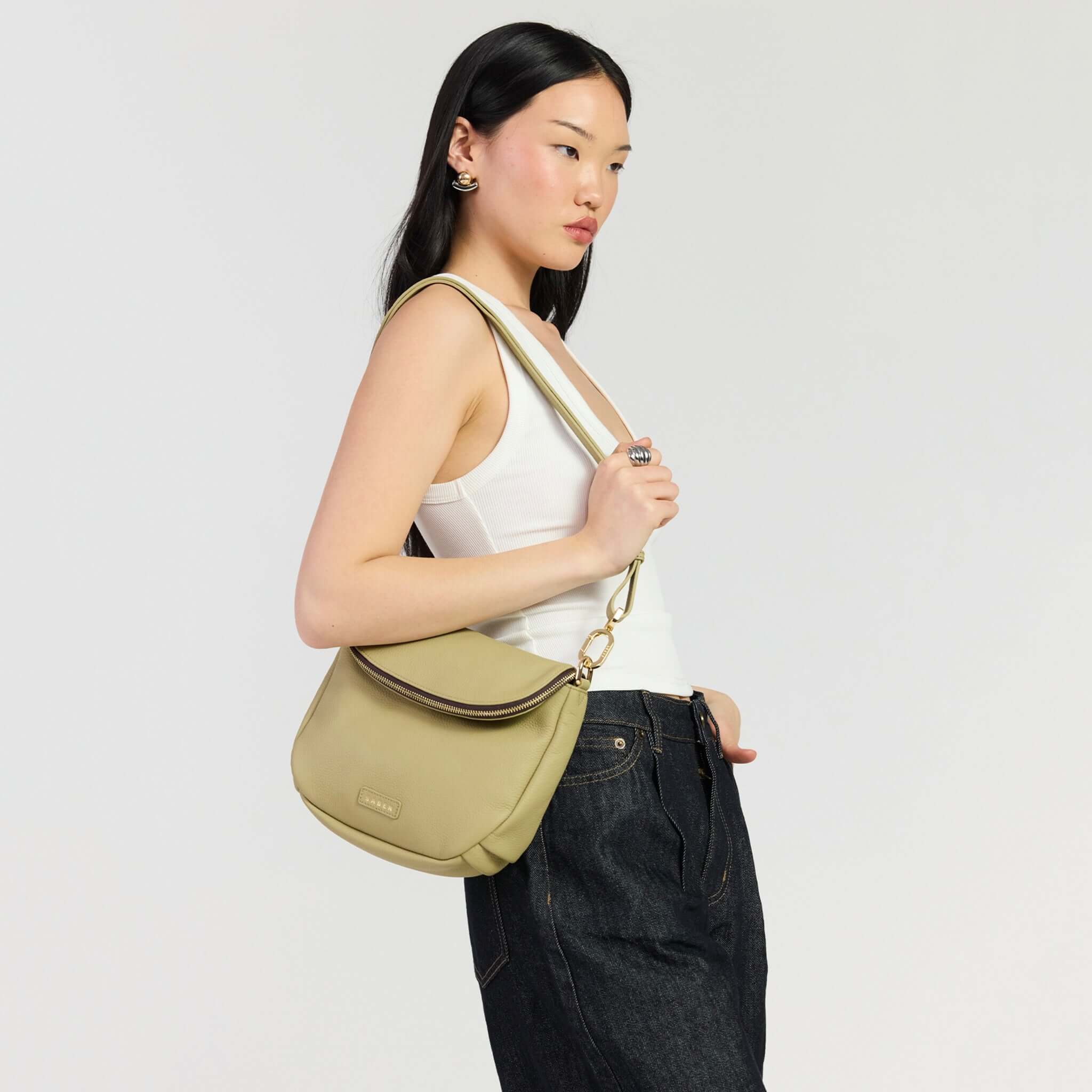 Saben Fifi Crossbody Bag - Willow shown on model, showcasing chic design and soft pebbled leather.