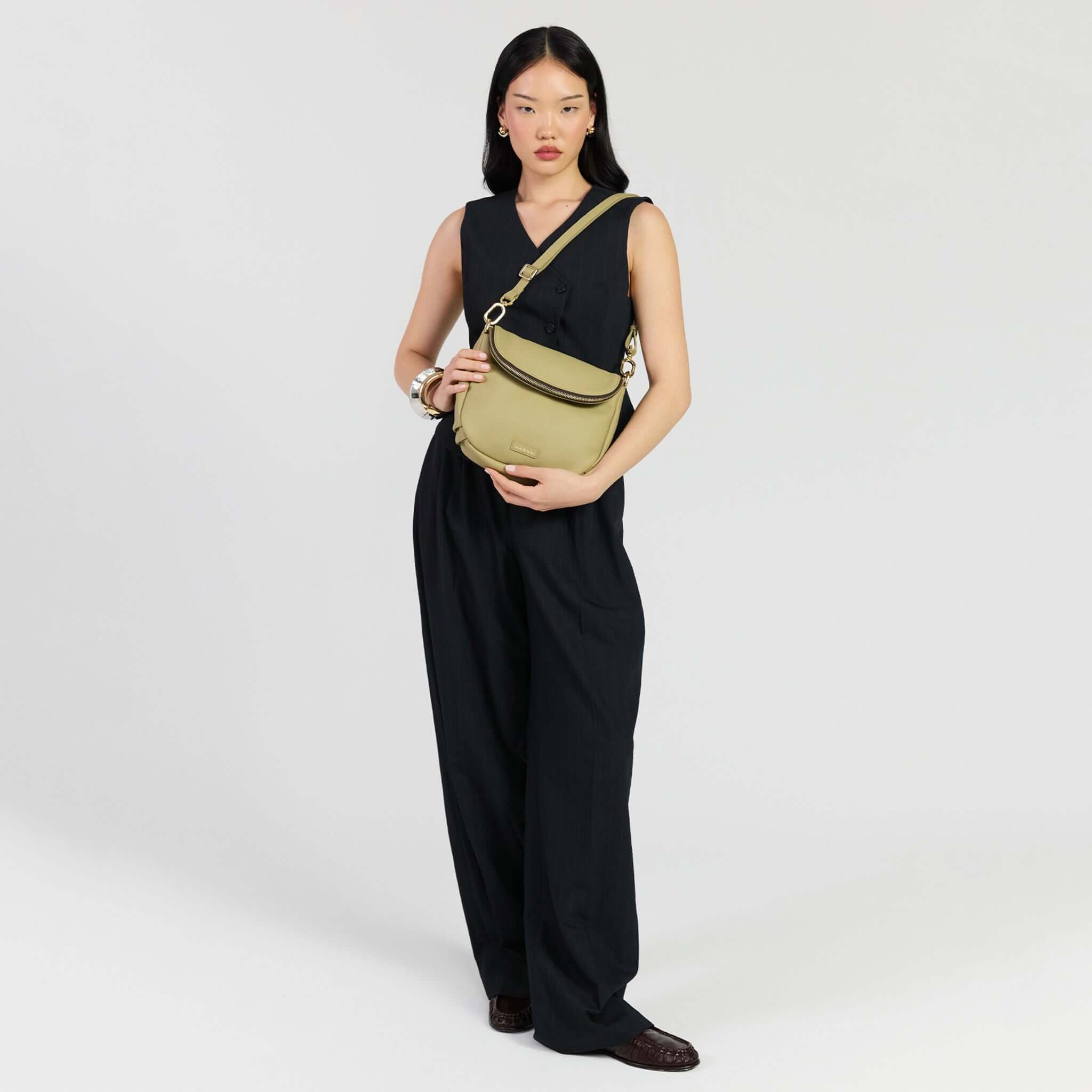 Saben Fifi Crossbody Bag - Willow shown in a stylish outfit, perfect for everyday use and chic occasions.