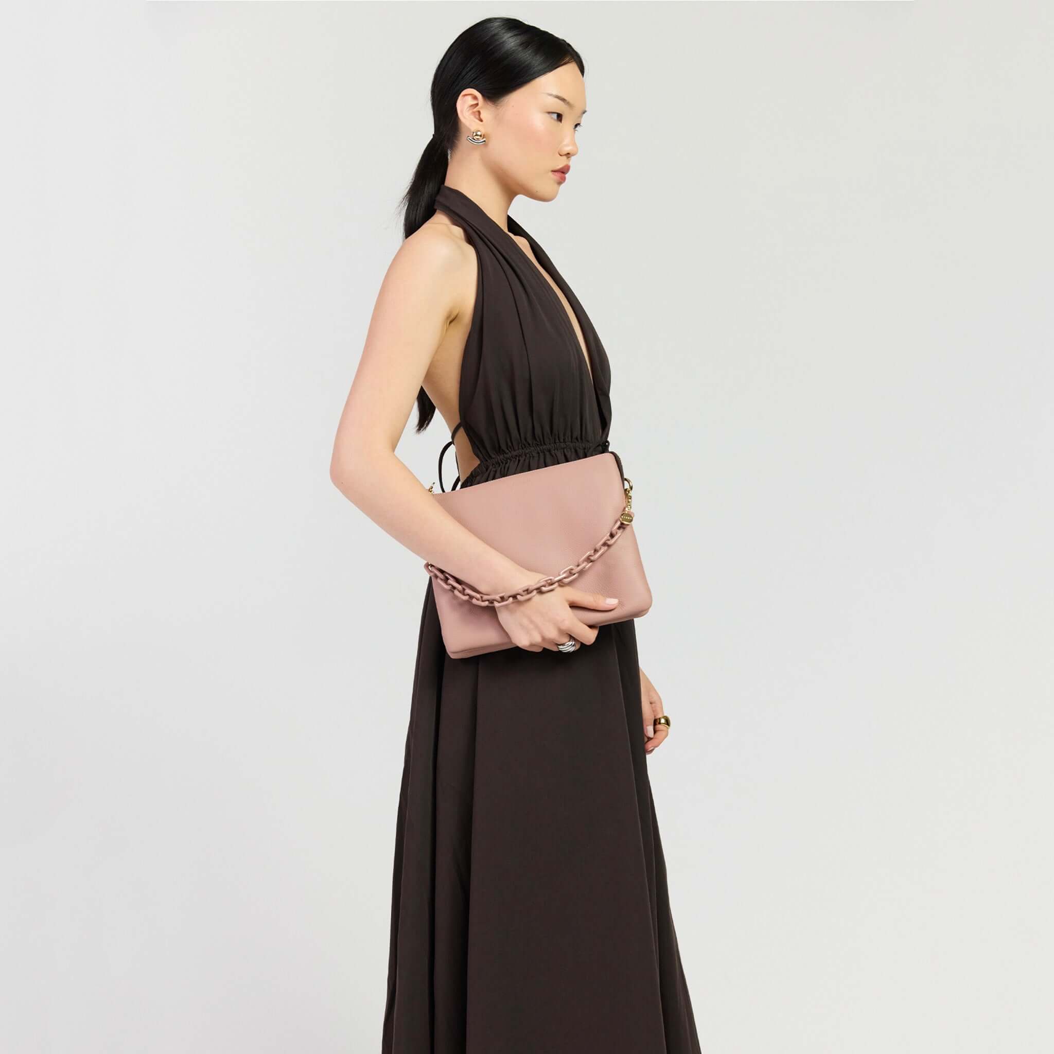 Saben Matilda Crossbody Bag - Rosewater with Tonal Chain displayed with a model in a stylish outfit.