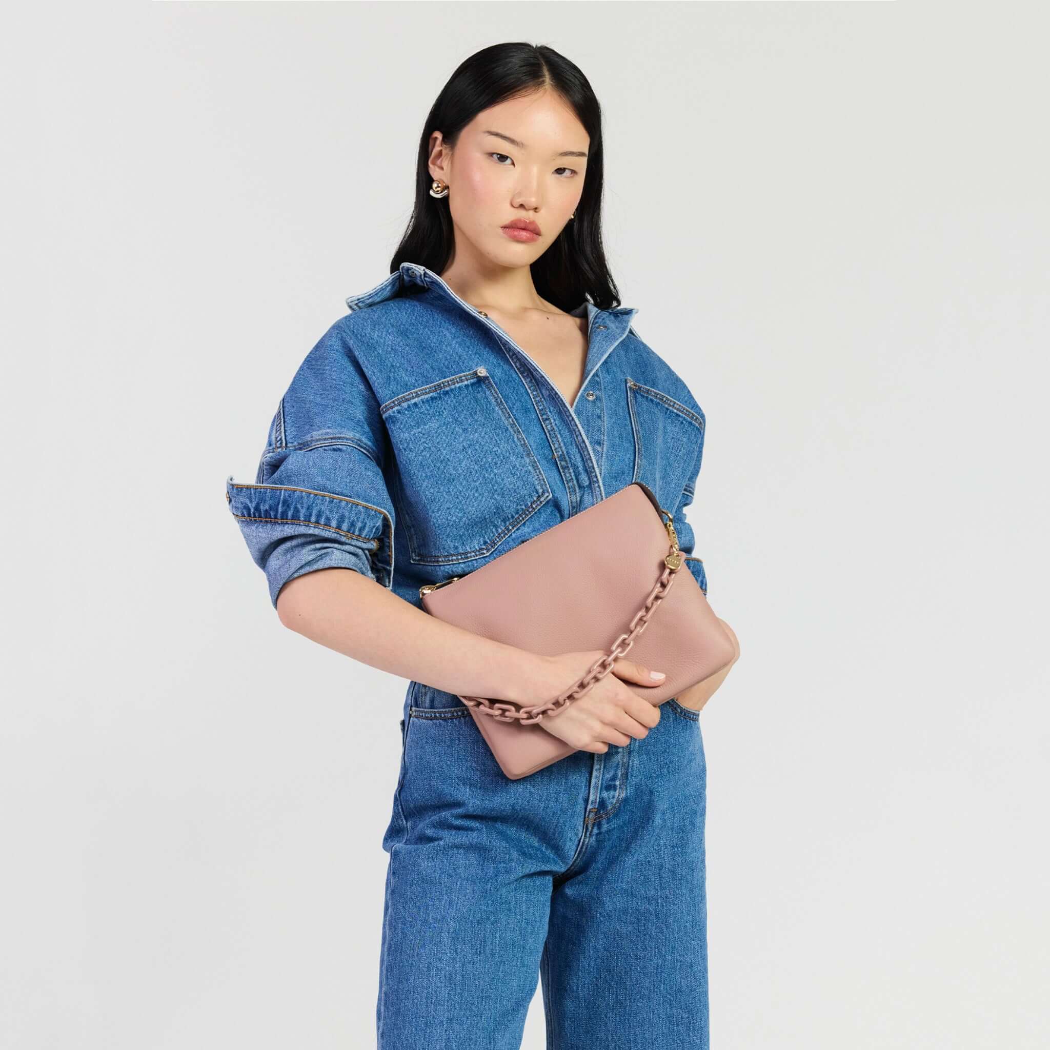 Saben Matilda Crossbody Bag - Rosewater with Tonal Chain model wearing denim outfit.