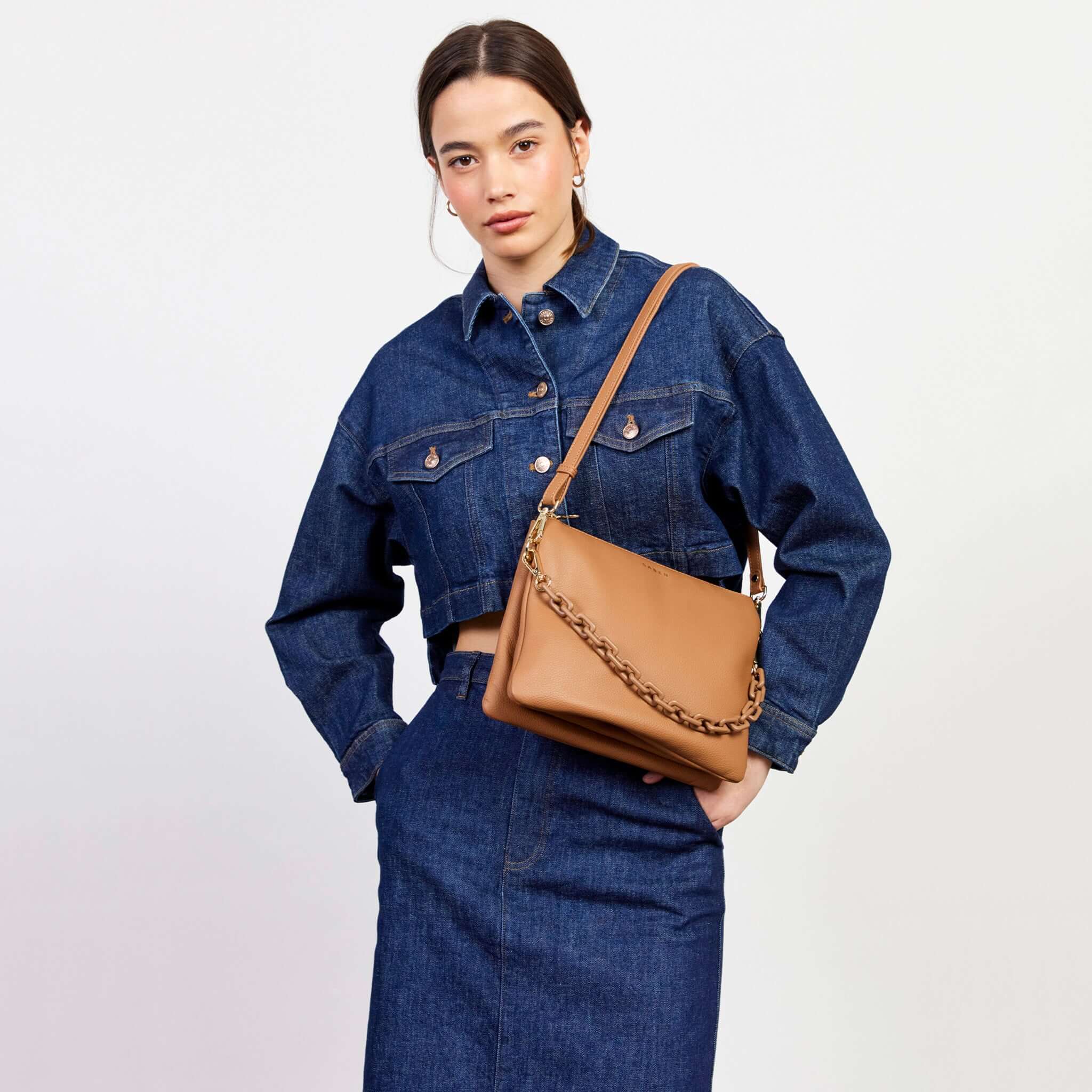 Saben Matilda Crossbody Bag - Toffee with Tonal Chain worn crossbody on model, toffee leather bag with tonal chain strap
