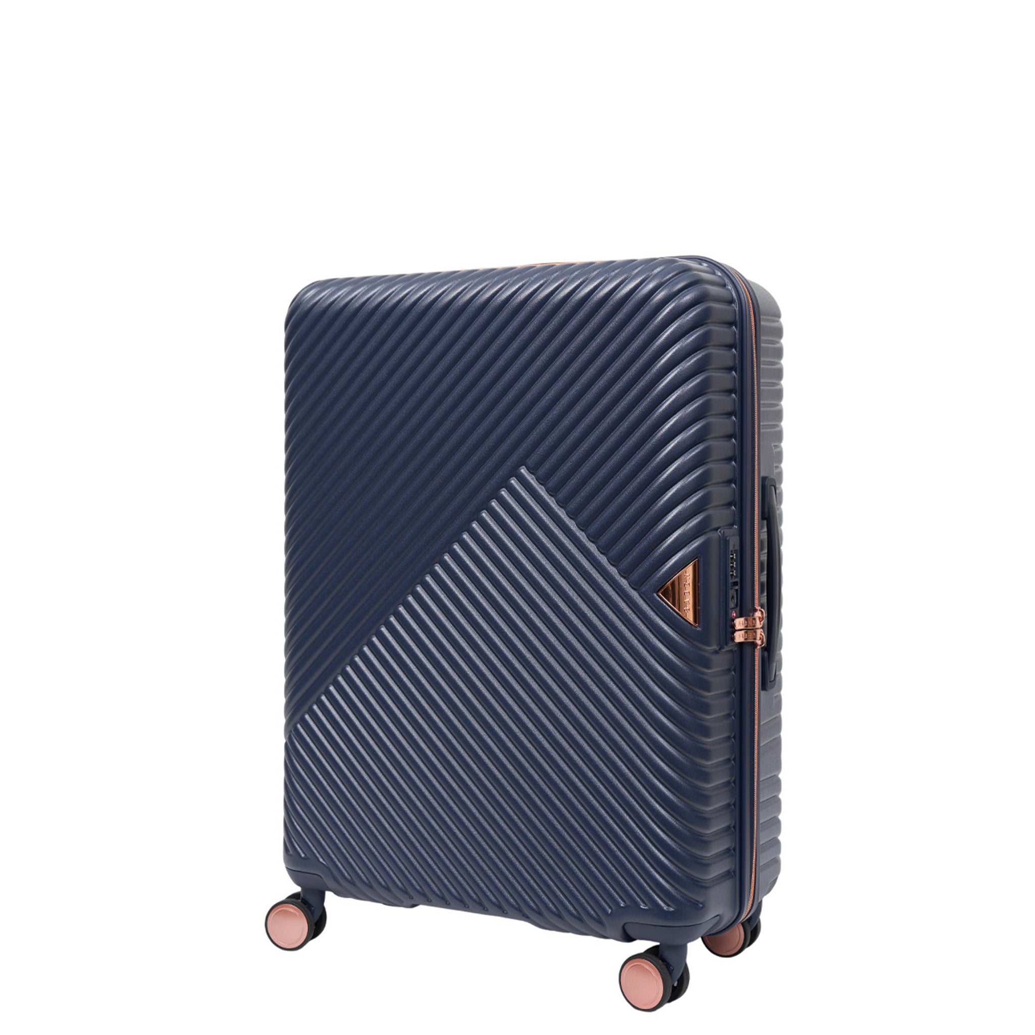 Navy blue suitcase with rose gold accents on a white background