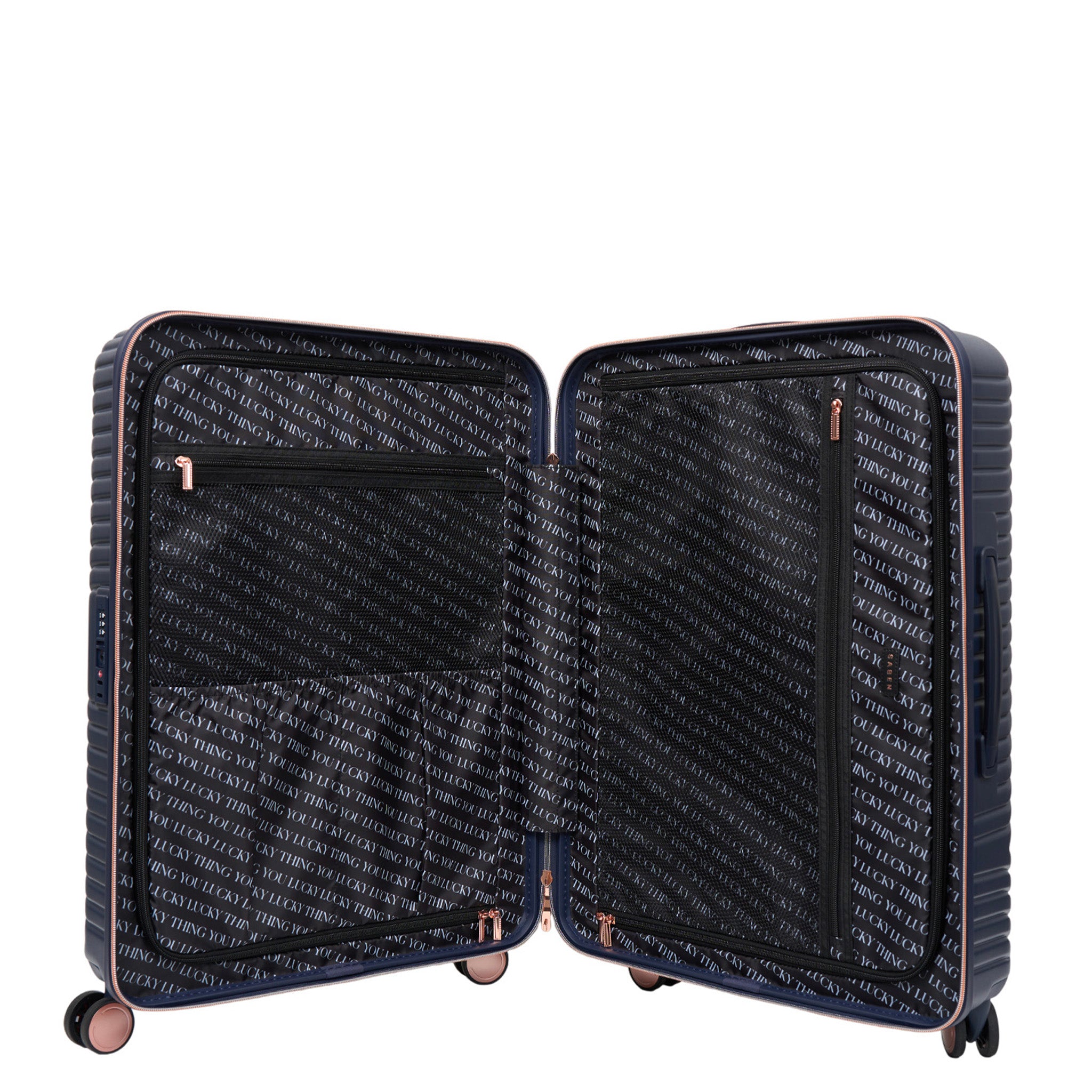 Open navy suitcase with rose gold accents on a white background