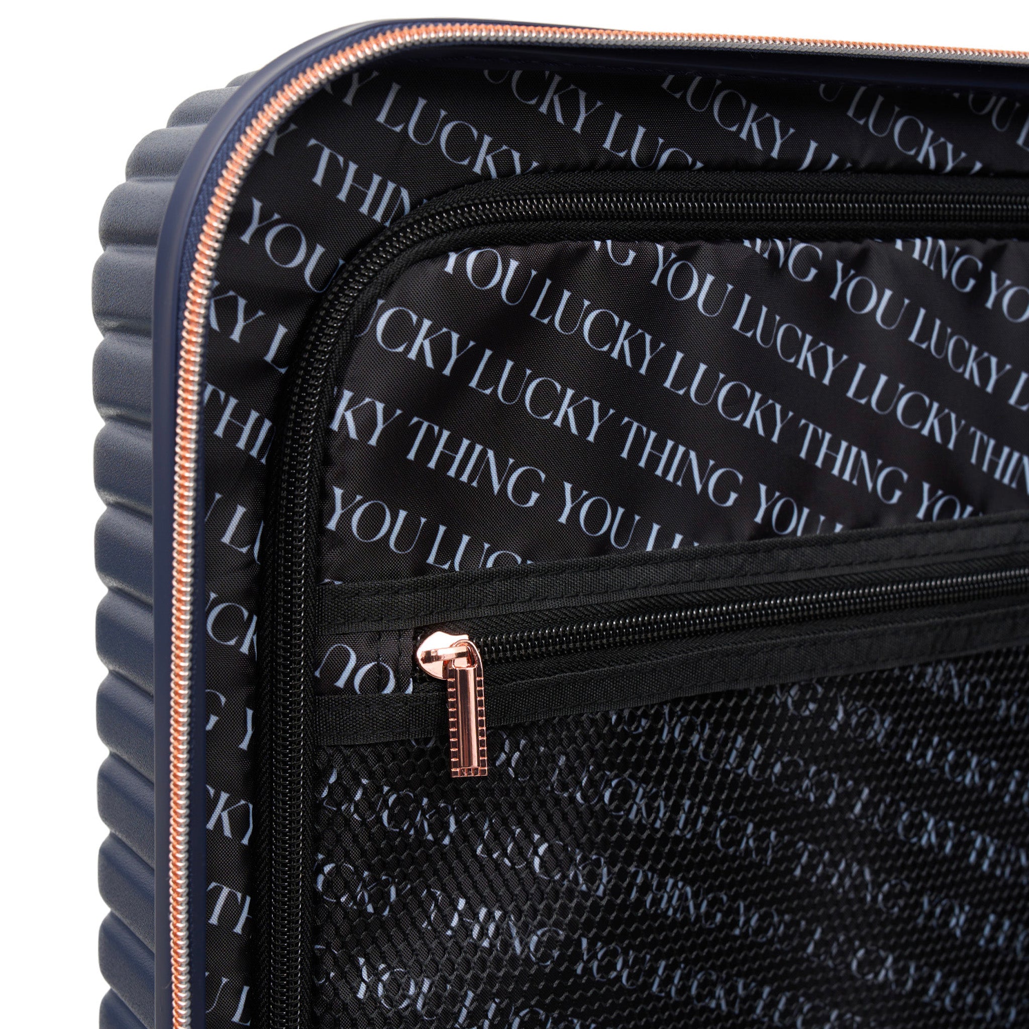 Black suitcase with text pattern and rose gold zipper