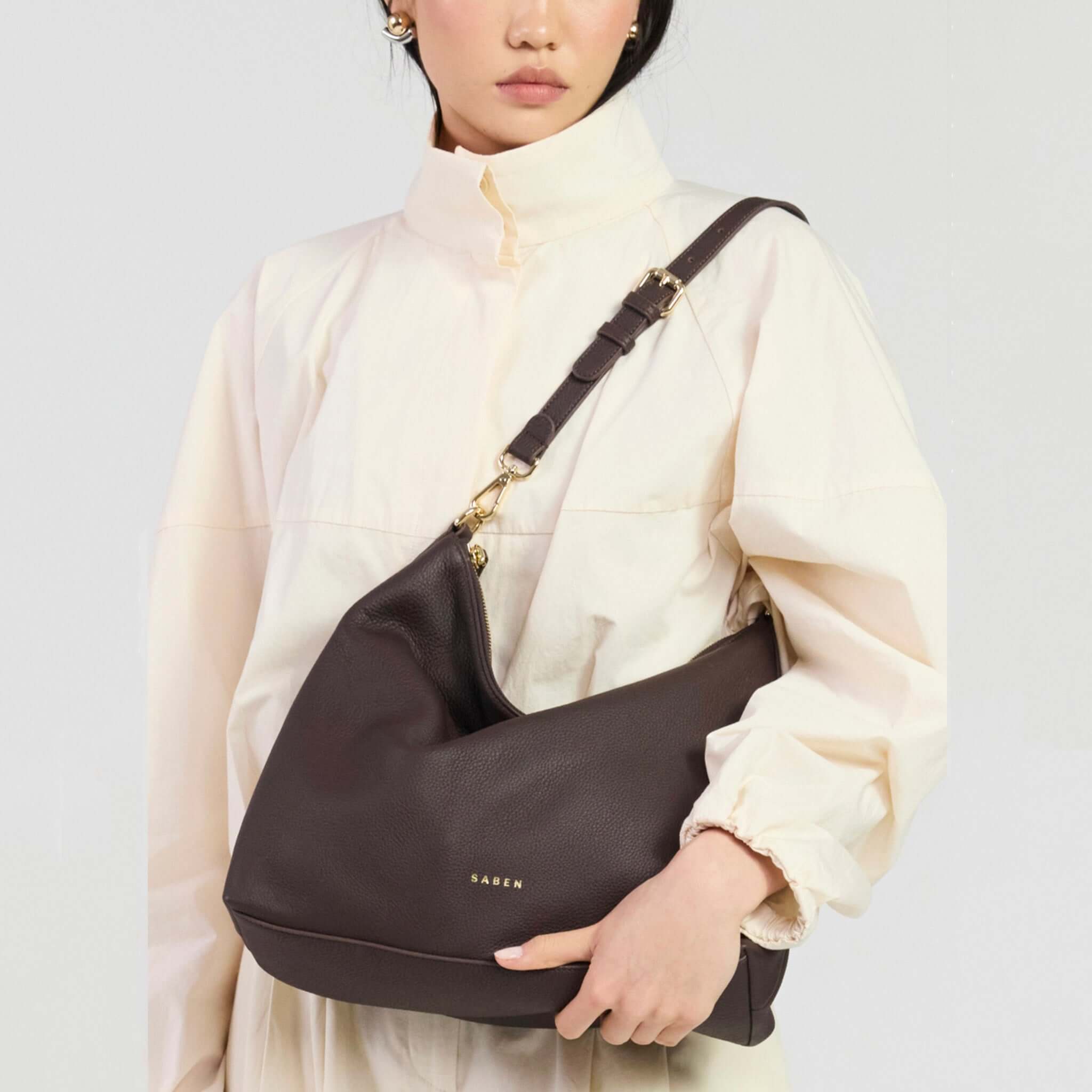 Saben Miki Shoulder Bag - Cacao Luxe worn by model in stylish outfit, showcasing its elegant design and functionality.