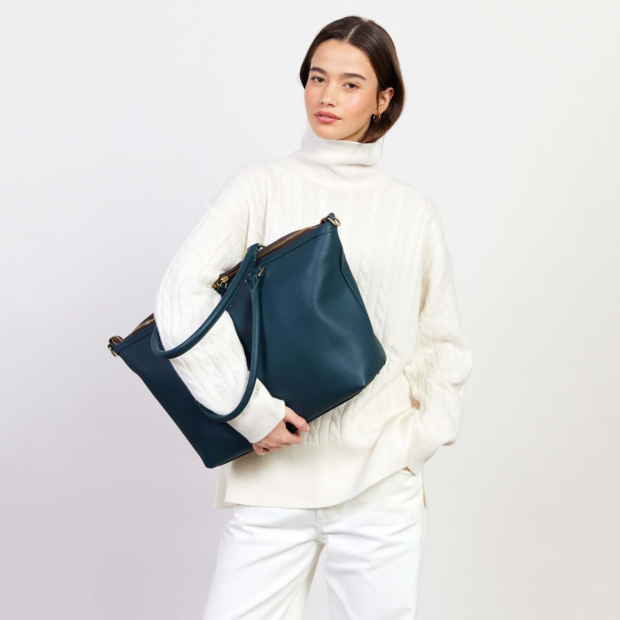 Alt Tag: Saben Milan Carry-All Bag - Hunter Green carried on shoulder, roomy water-resistant carry-all tote for work, gym or baby bag