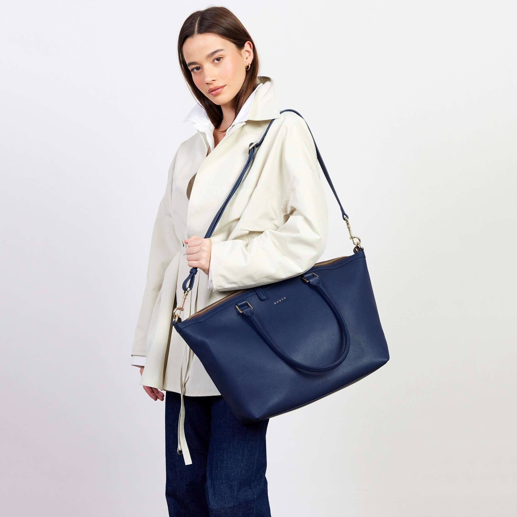 Saben Roma Weekender Carry-All Bag - Ink worn by model in a stylish outfit, showcasing its practical design.